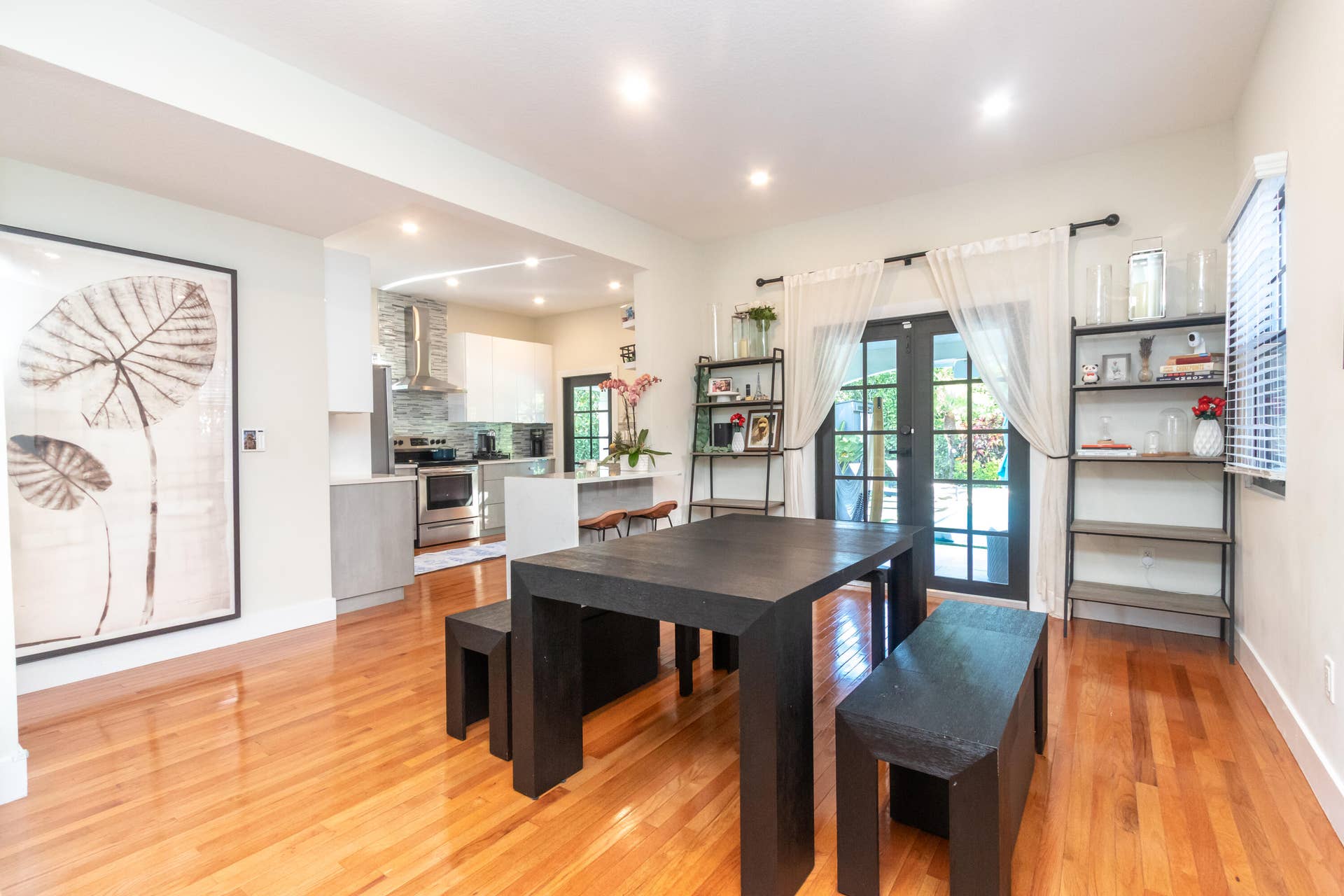 Open floorplan flows seamlessly from dining area to kitchen
