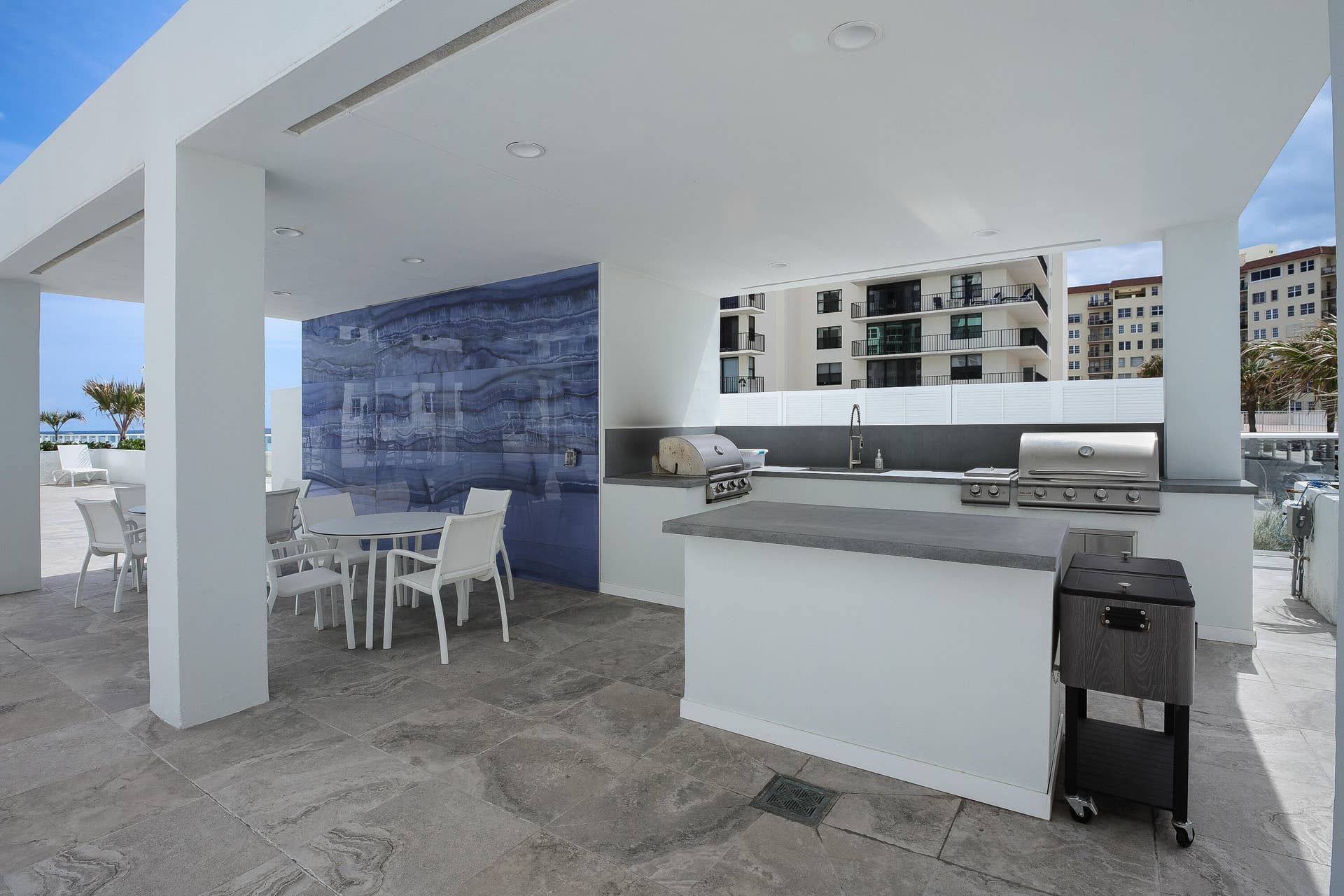 3450 S Ocean Boulevard, #106, Palm Beach, FL 33480 outside grill on pool deck