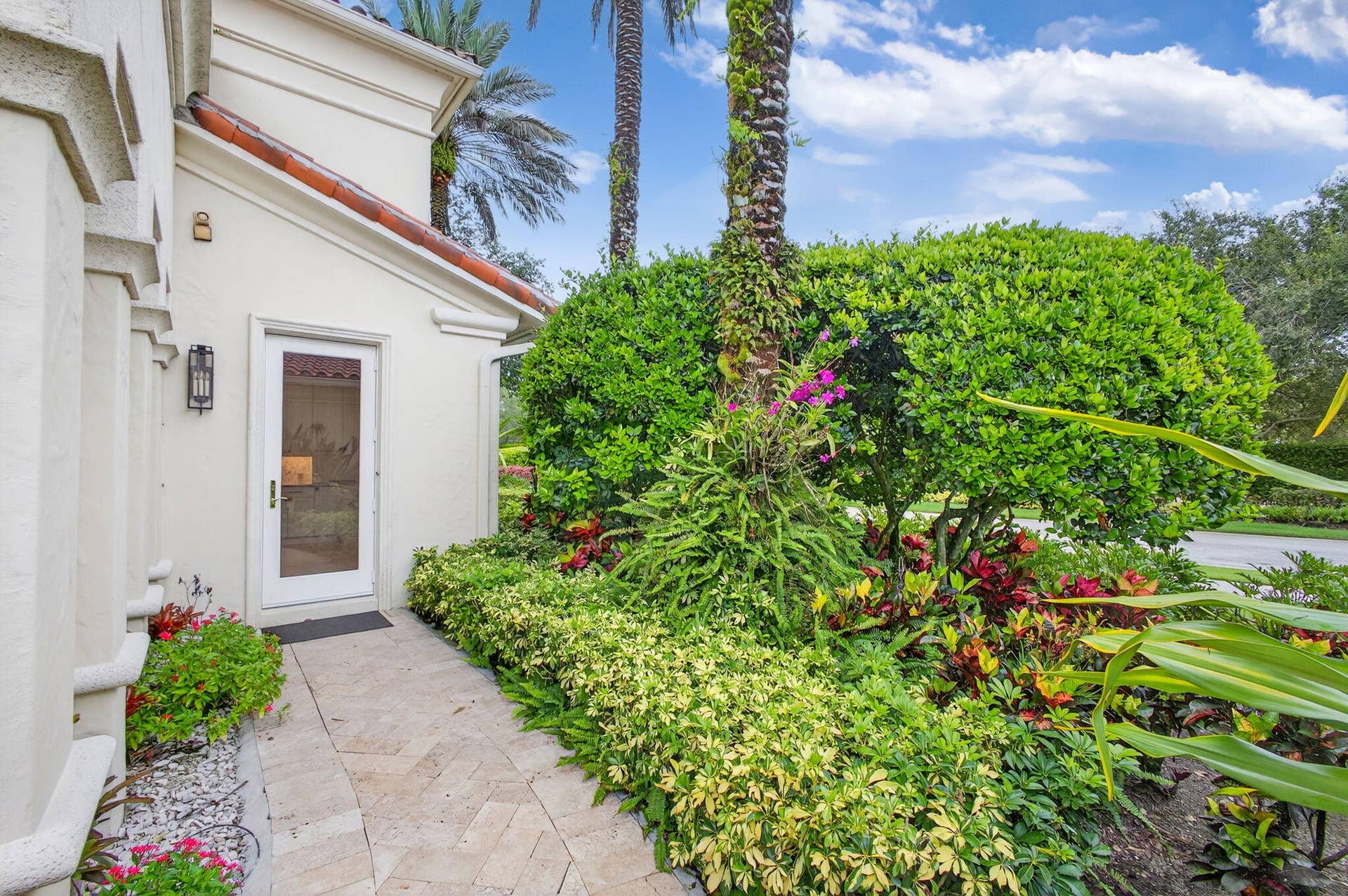 11912 Palma Drive, Palm Beach Gardens, FL 33418 Walkway from Garage to Estate