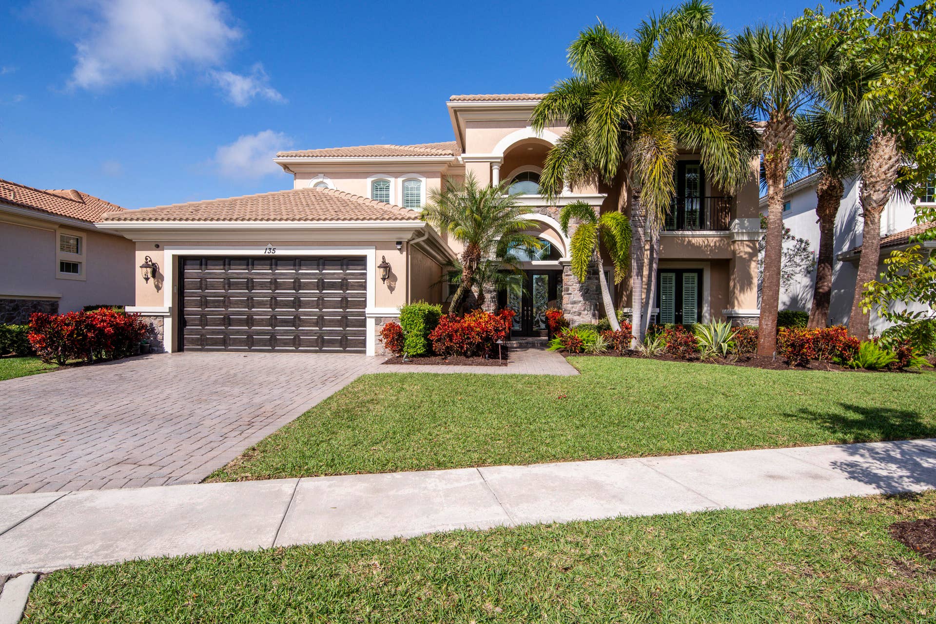 135 Carmela Court, Jupiter, FL 33478 3 Car Tandem Garage