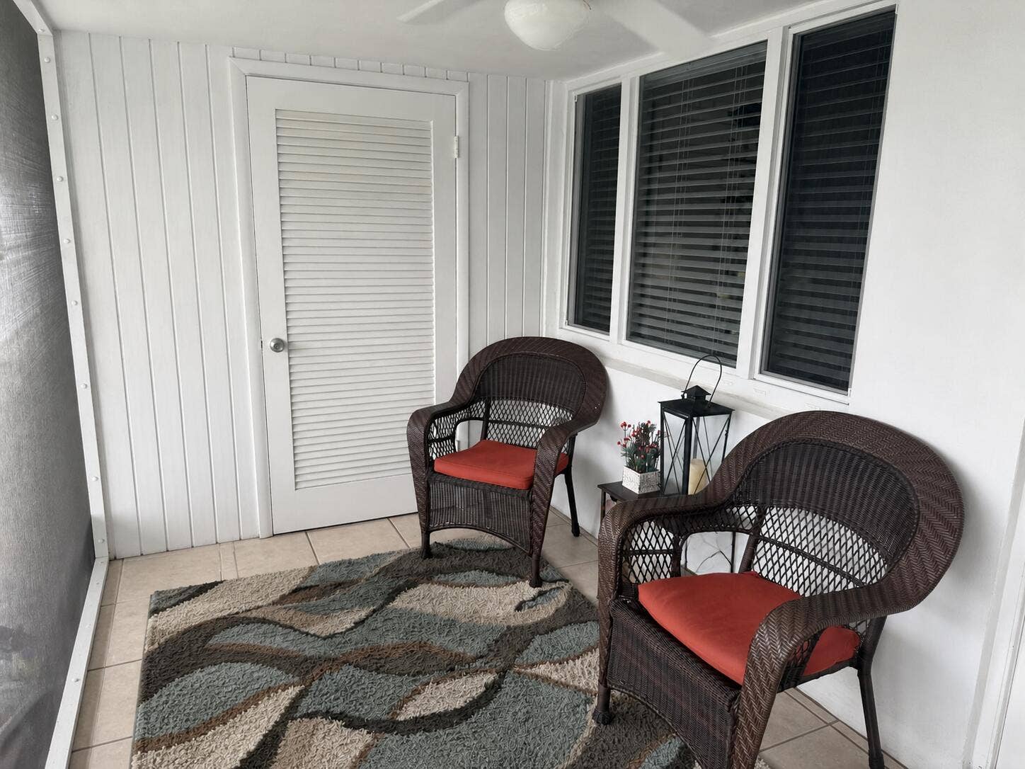111 Shore Court, #302, North Palm Beach, FL 33408 Screened porch over looking the water