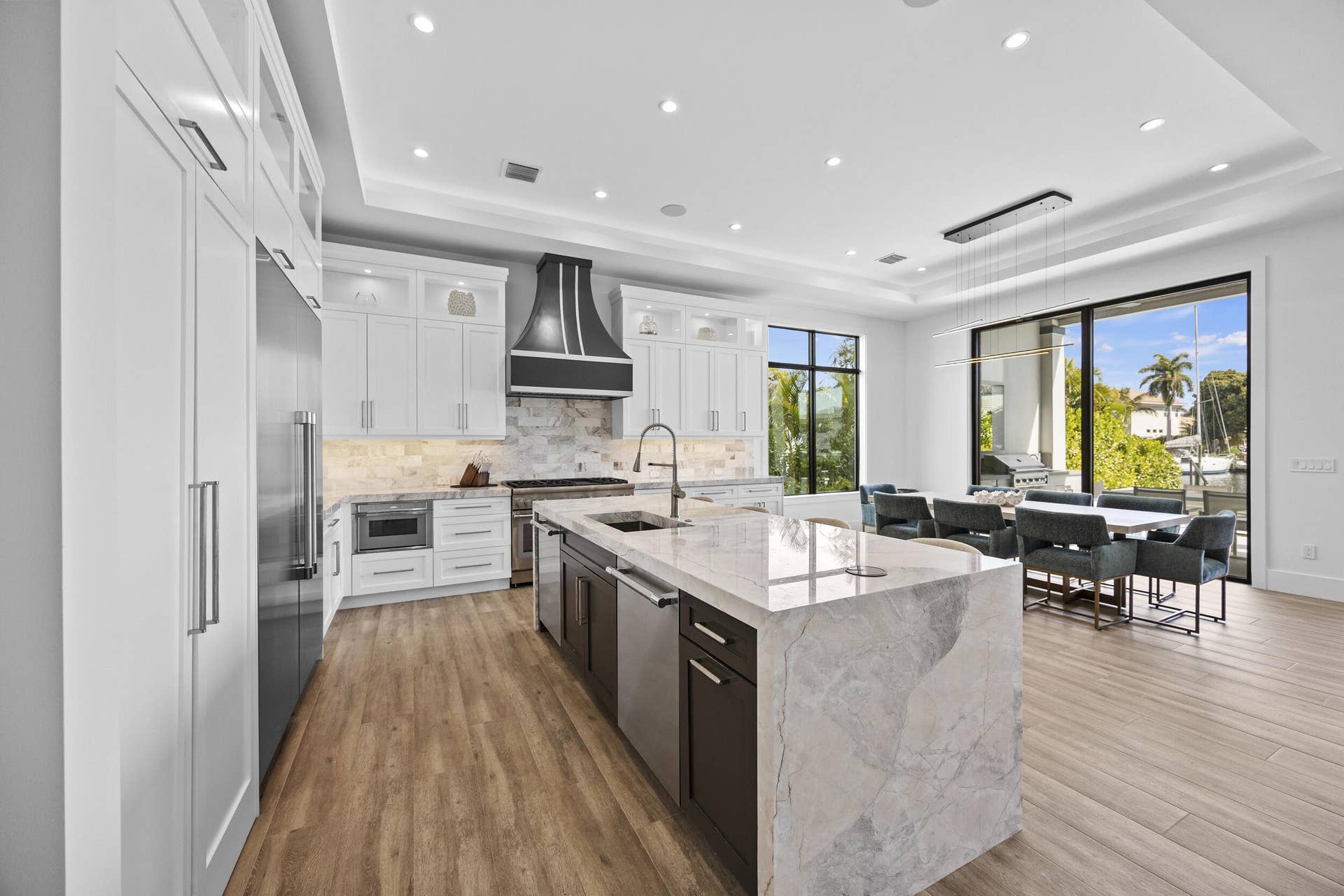 736 Lagoon Drive, North Palm Beach, FL 33408 Quartzite Waterfall Thick Edge Island with dual Thermador dishwashers