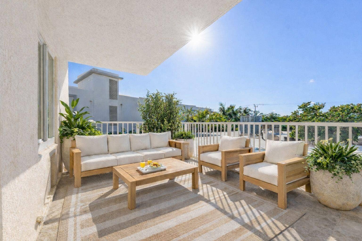 1203 Hillsboro Mile, #P3, Hillsboro Beach, FL 33062 Digitally Staged: Rear Patio Daytime