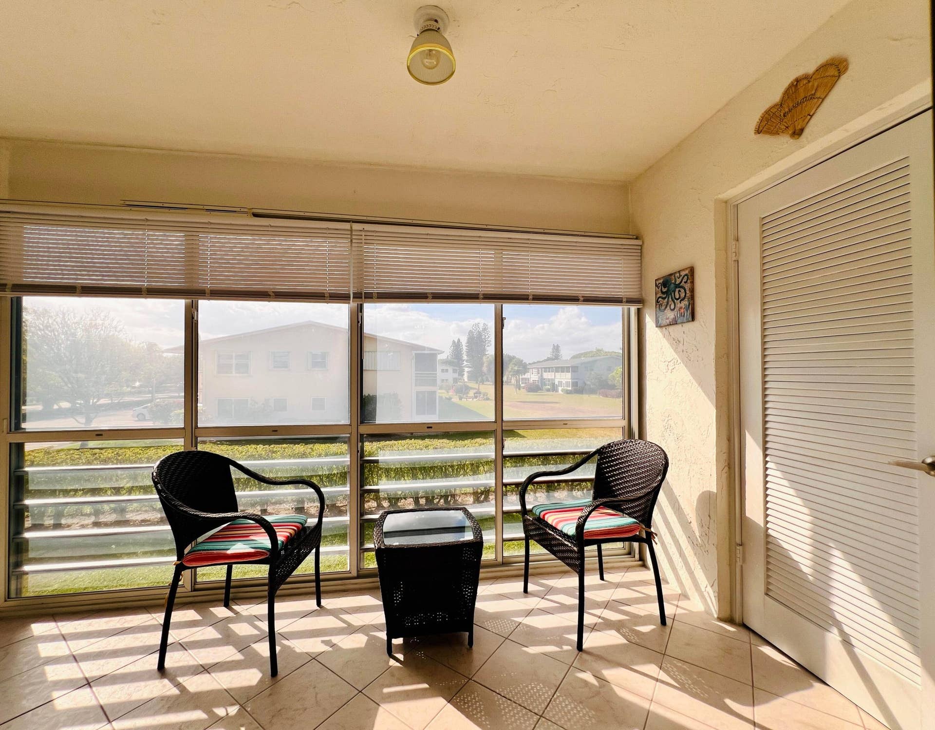 203 Oxford 500, West Palm Beach, FL 33417 Lovely Lanai With Tile Floors & Large Storage Closet Housing the Dryer
