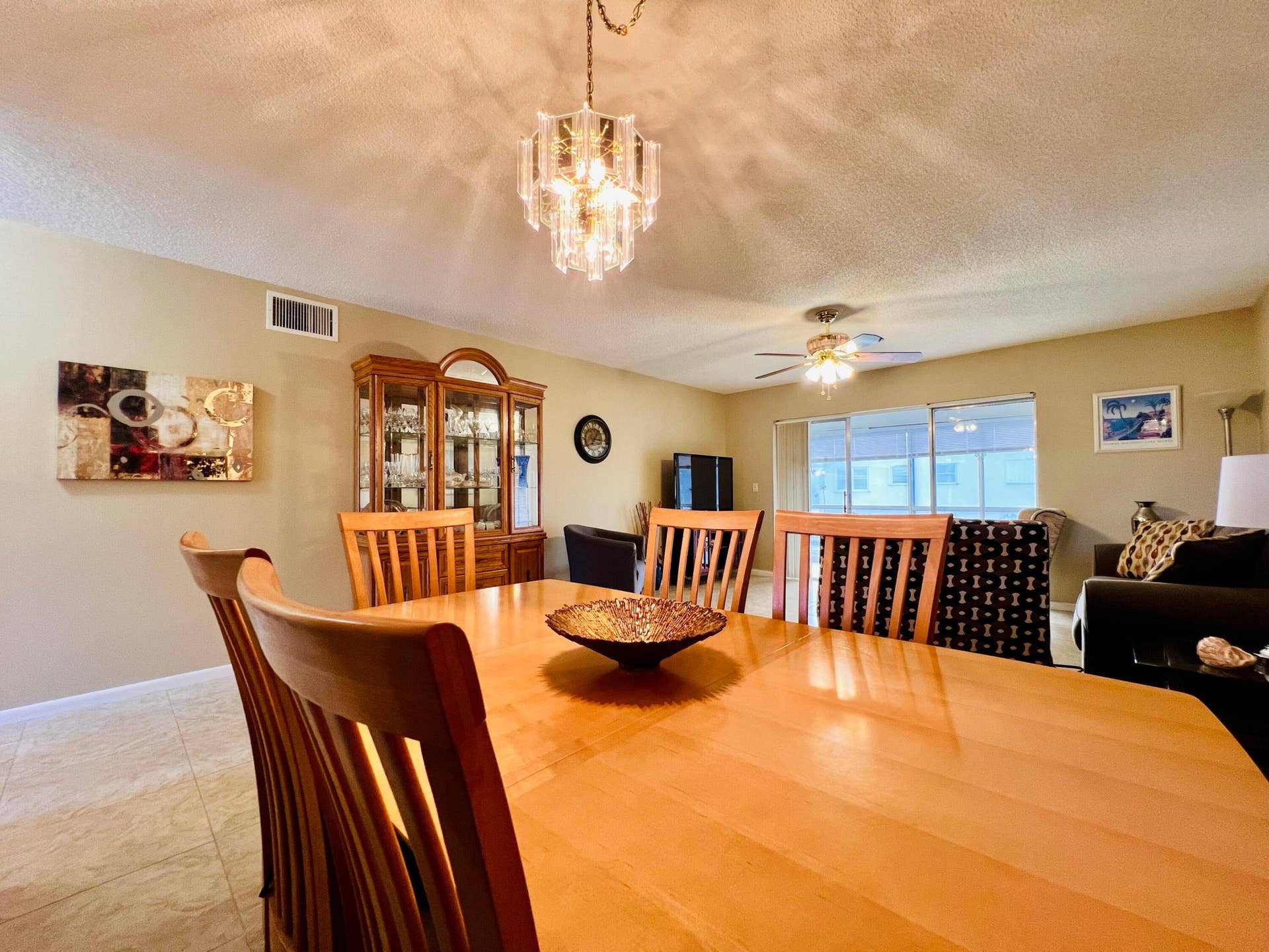 203 Oxford 500, West Palm Beach, FL 33417 Dining Area to Living Area. Sold Furnished As Shown (Fireplace Excluded)
