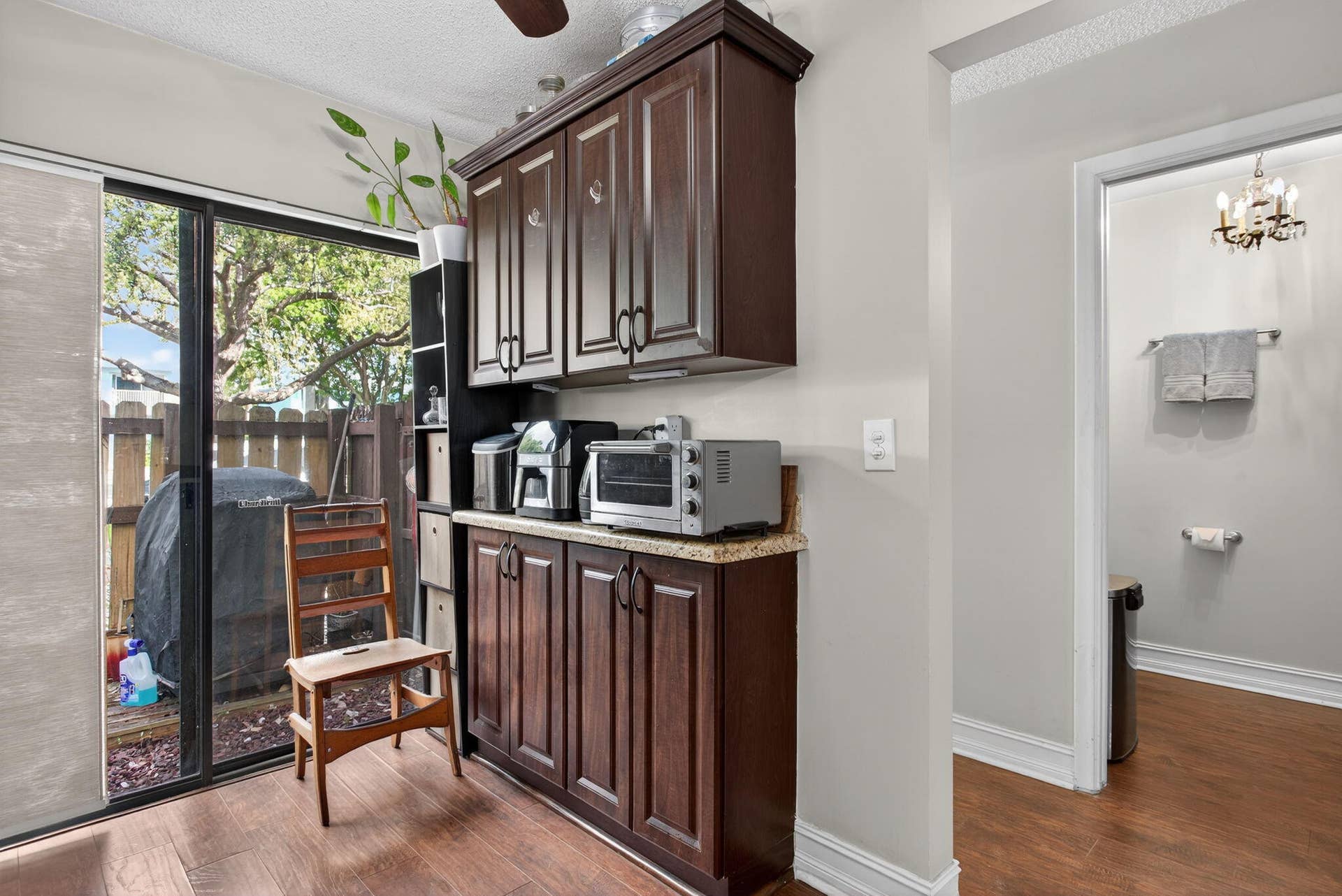 Storage Cabinetry/Front Patio Sliders