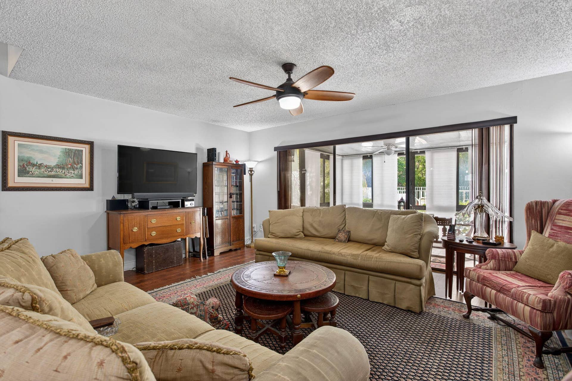 Living Space w/Sliders to enclosed patio