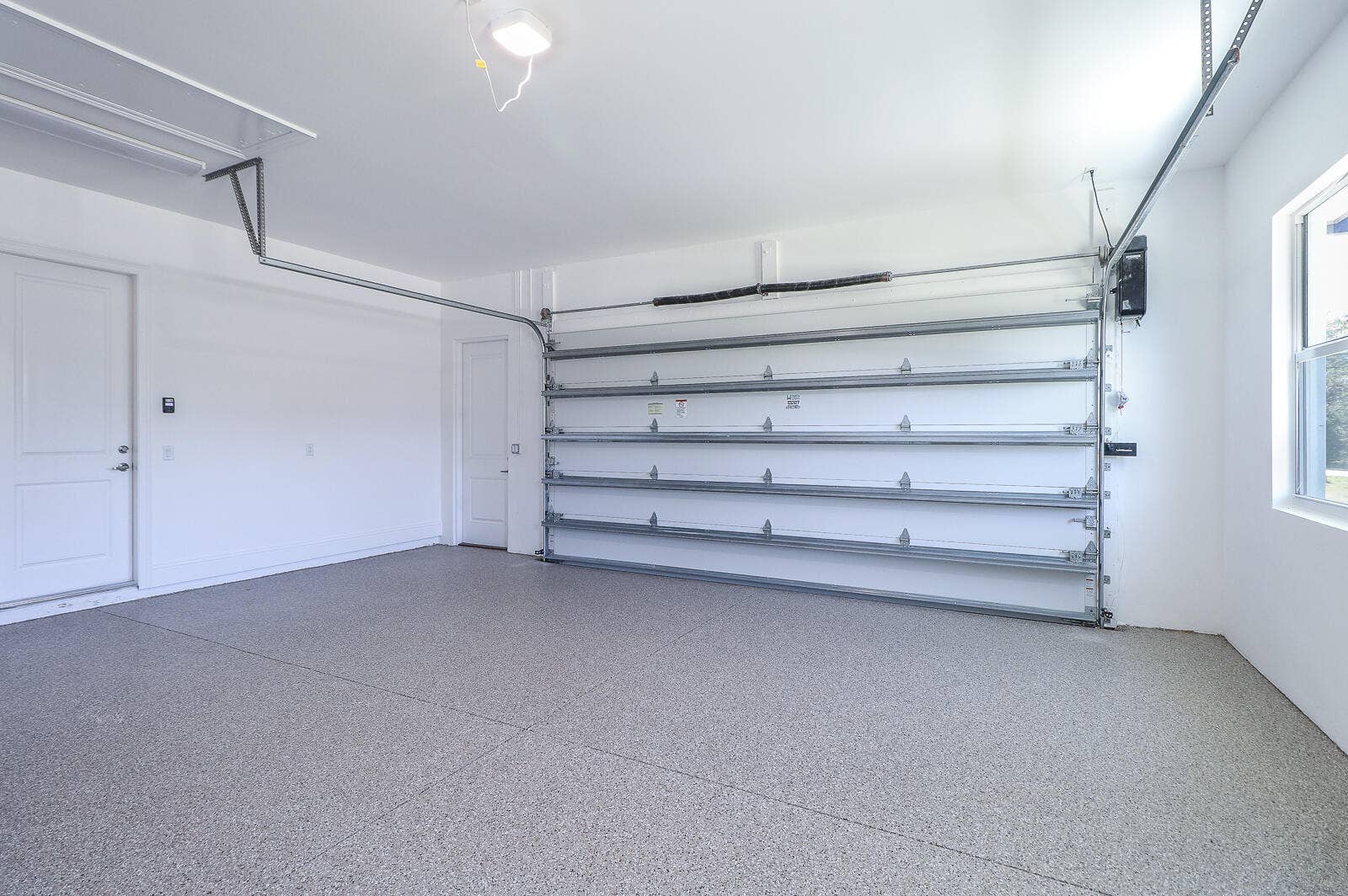 7595 155th Place N, Palm Beach Gardens, FL 33418 46-Garage
