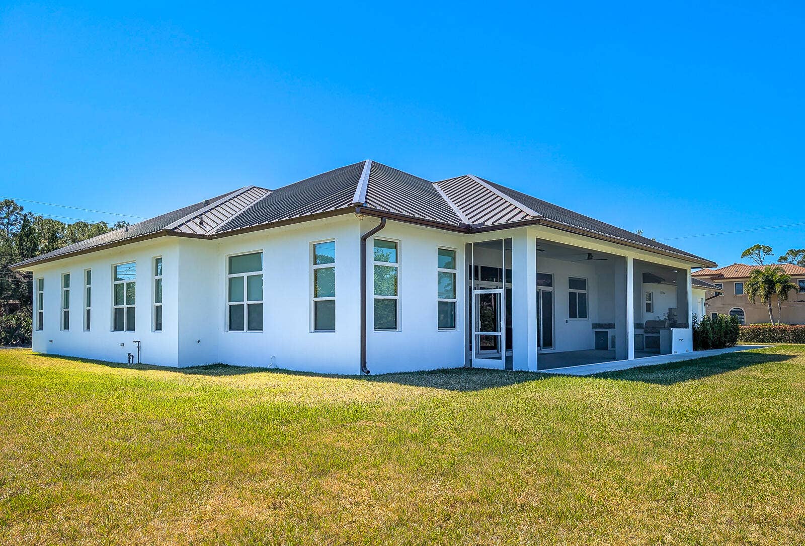 7595 155th Place N, Palm Beach Gardens, FL 33418 51-Rear Exterior