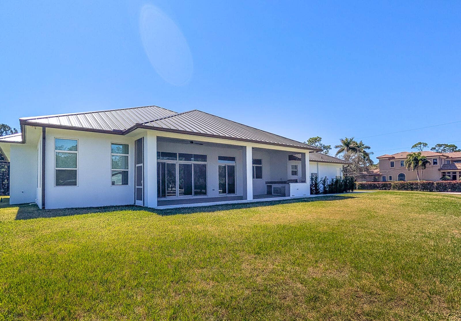 7595 155th Place N, Palm Beach Gardens, FL 33418 52-Rear Exterior