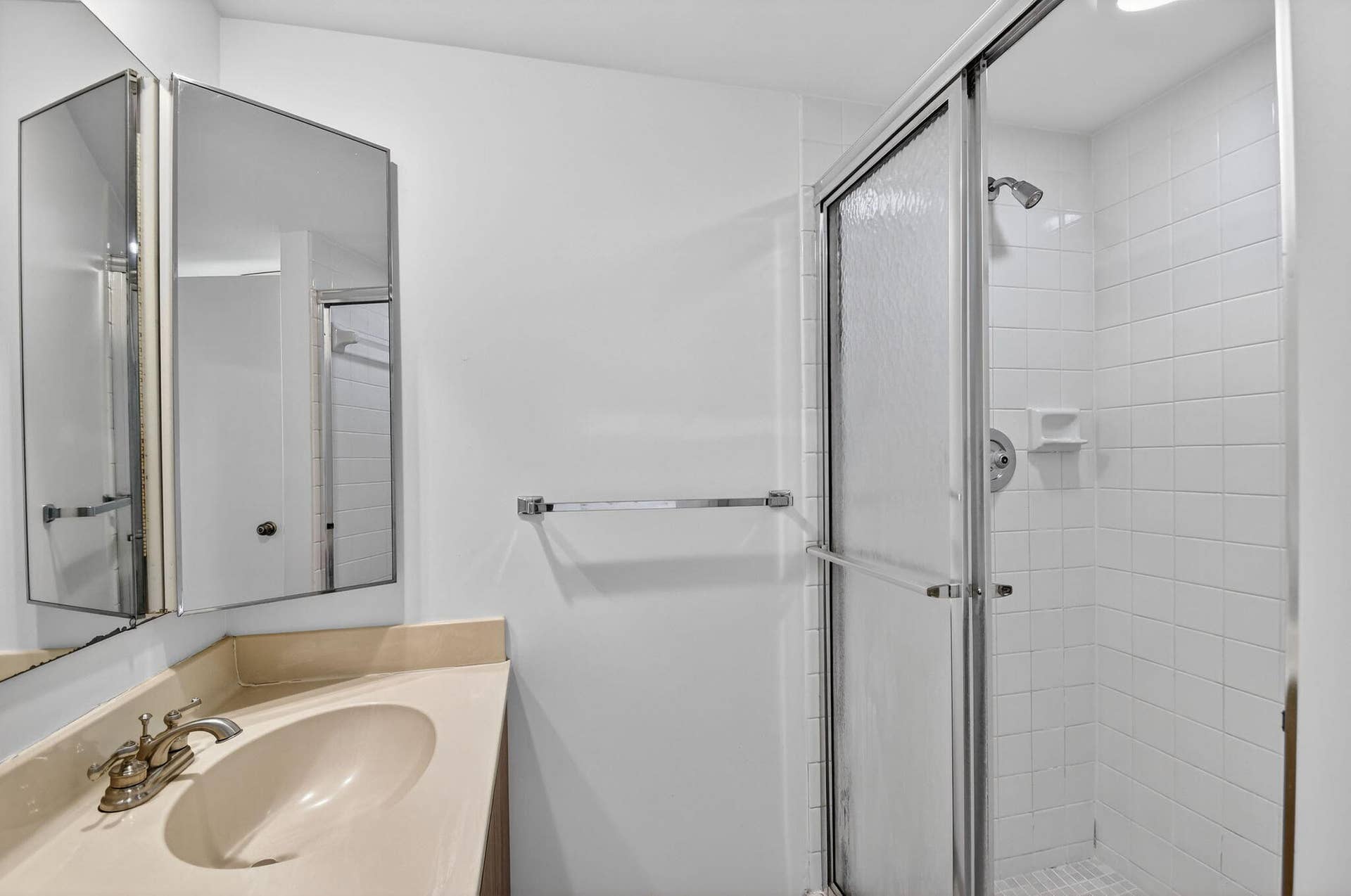 4210 42nd Way, West Palm Beach, FL 33407 Primary bathroom has step in shower
