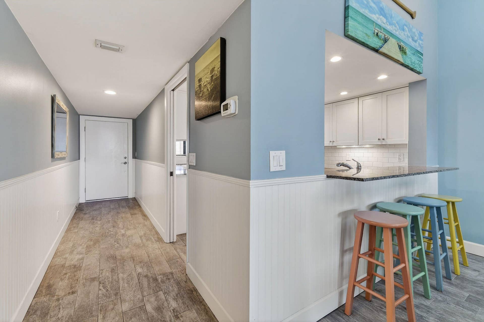 Front Entry and Hallway in relation to kitchen