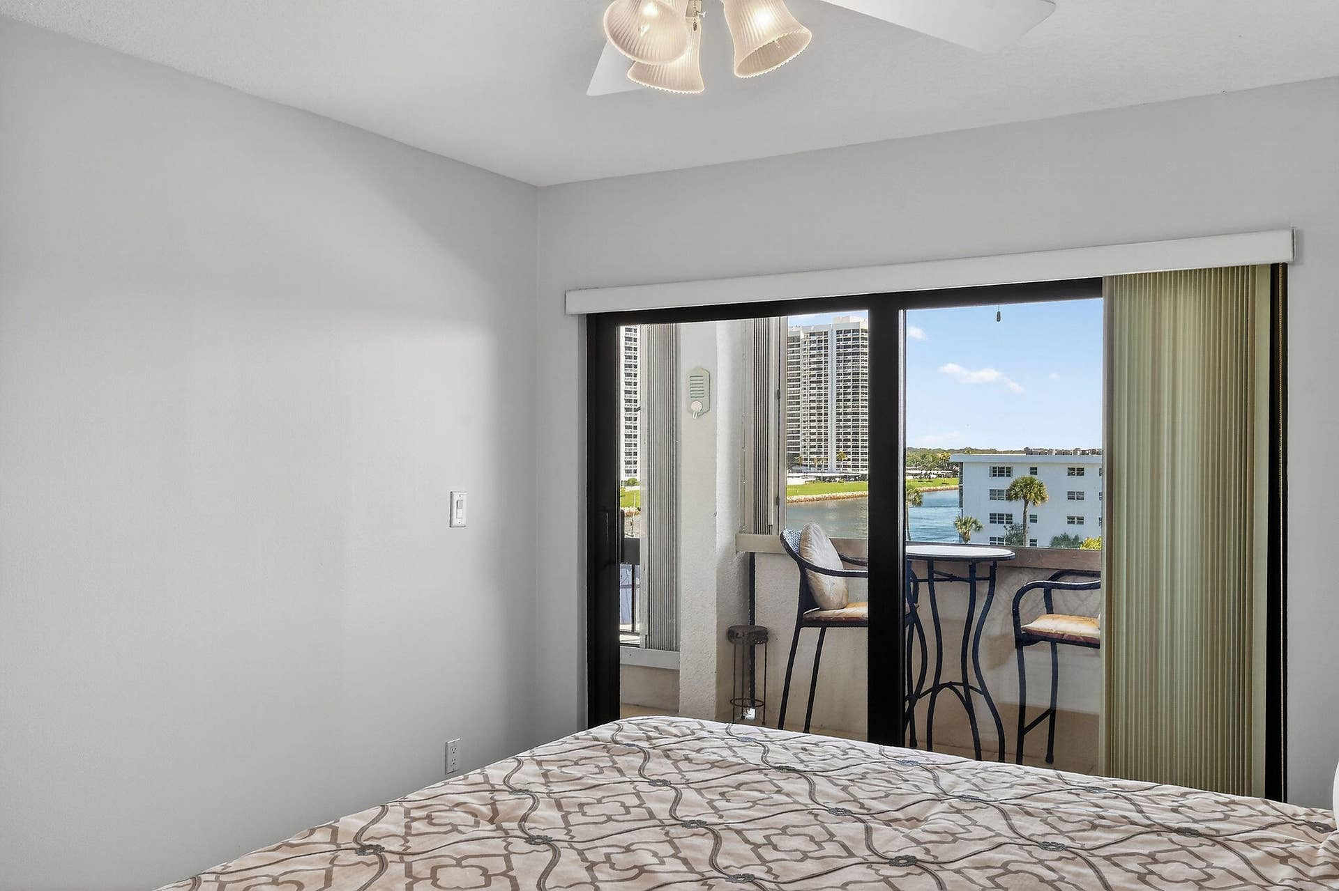 Sliding Door to Balcony and View from Master Bedroom