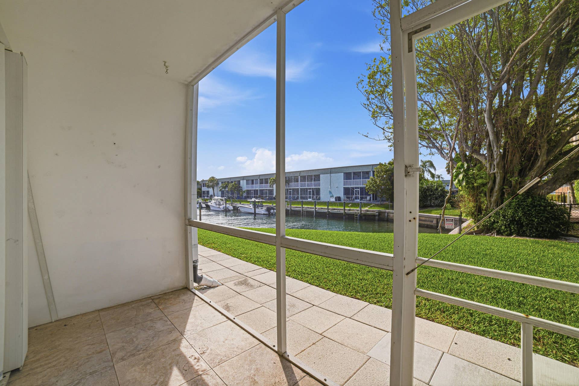 130 Doolen Court, #108, North Palm Beach, FL 33408 Screened Patio off of Master Bedroom