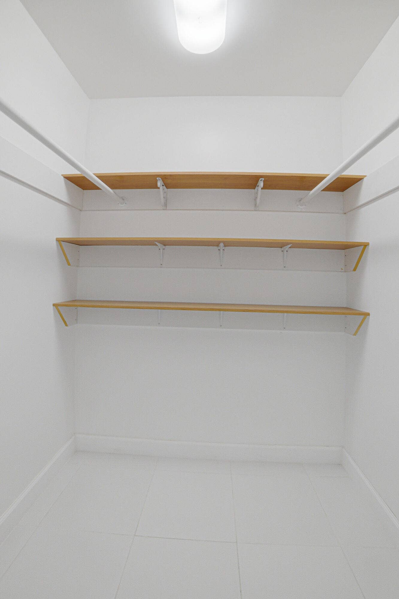 130 Doolen Court, #108, North Palm Beach, FL 33408 Master Bedroom Walk-In Closet