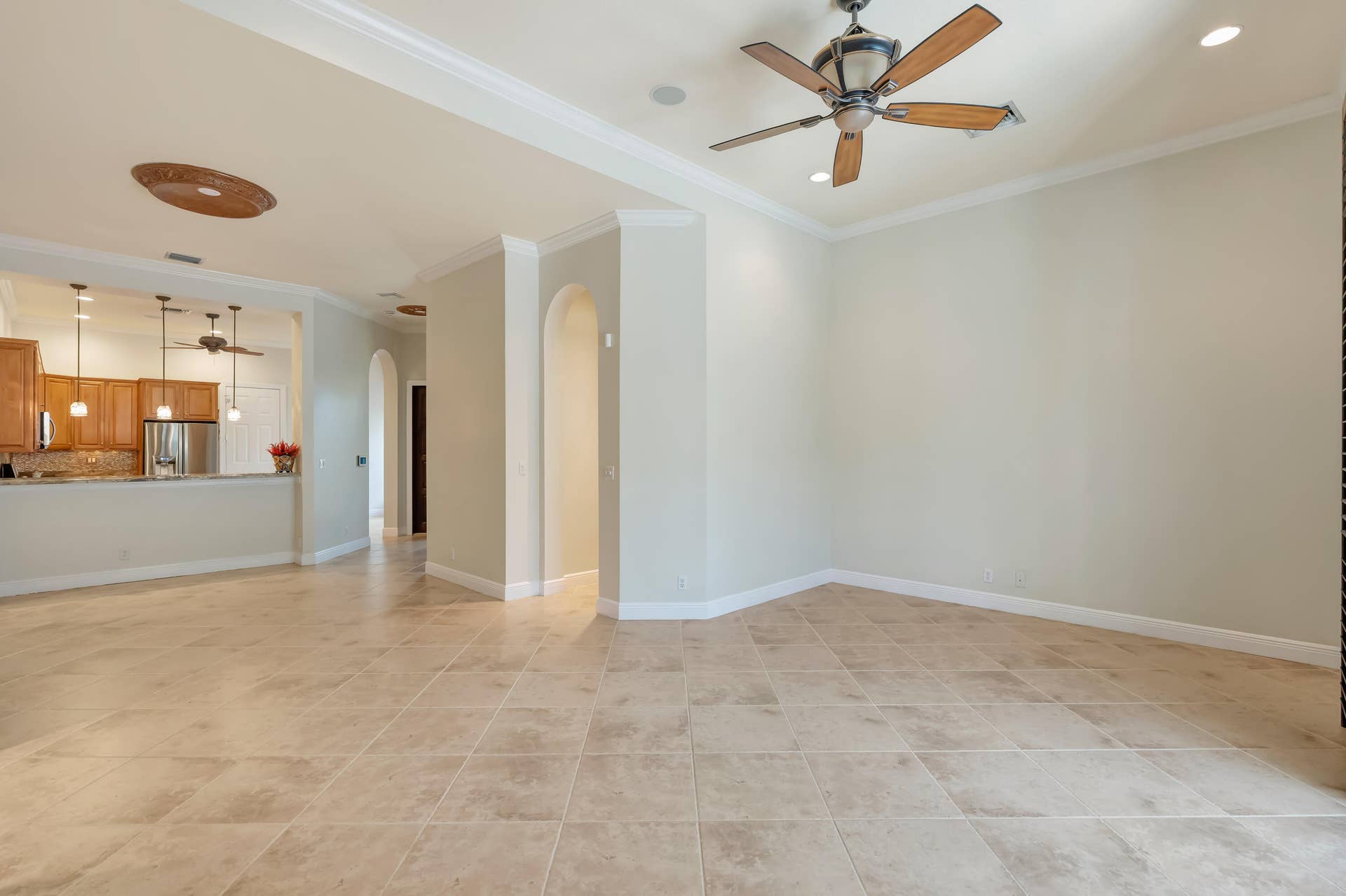 104 Renaissance Drive, North Palm Beach, FL 33410 sitting area looking back to kitchen