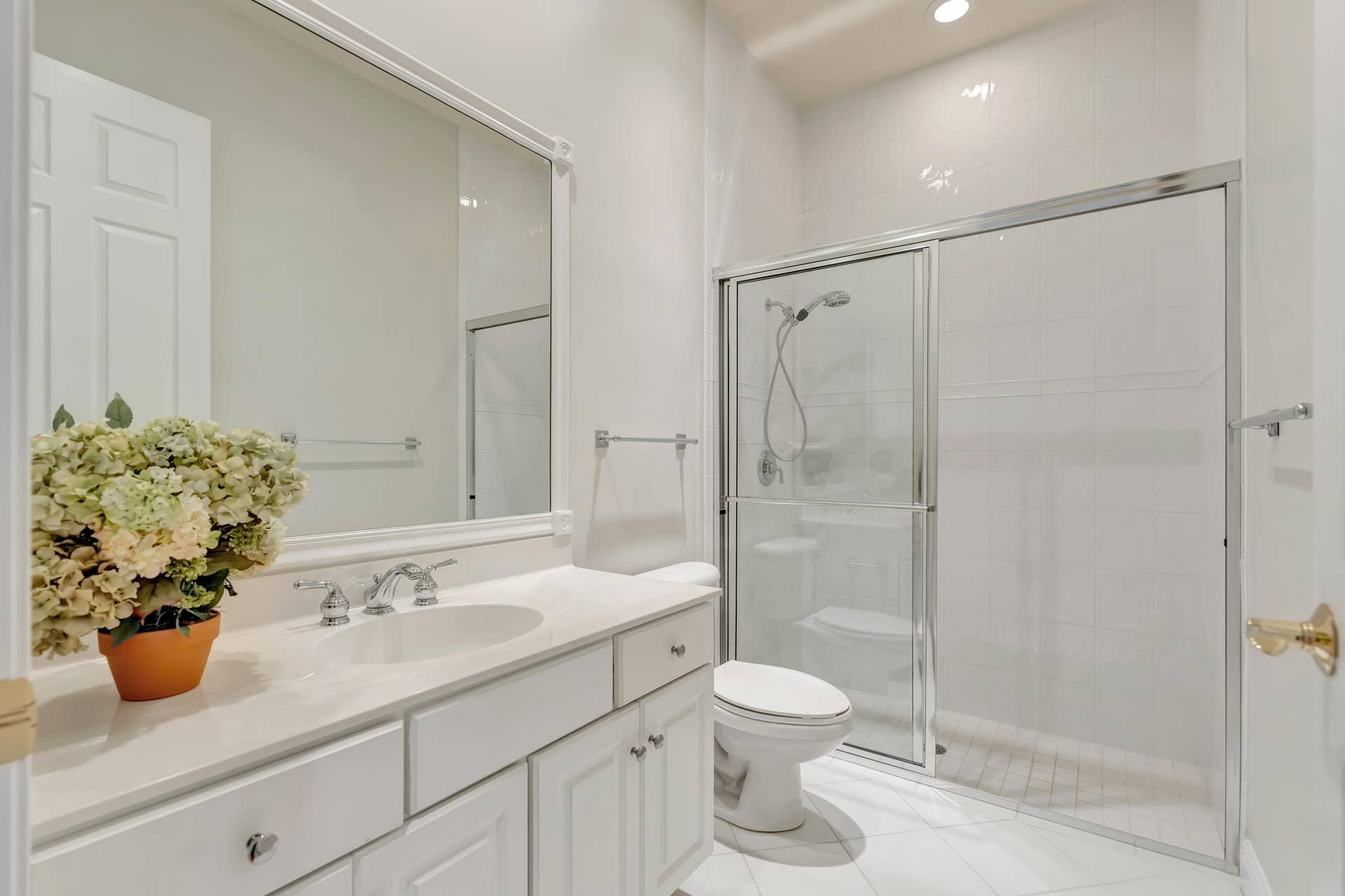 104 Renaissance Drive, North Palm Beach, FL 33410 spacious bathroom with walk-in shower