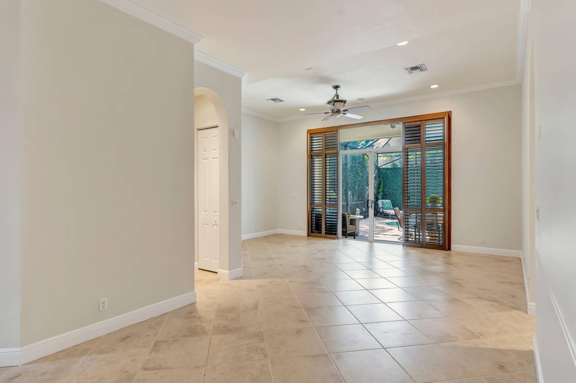 104 Renaissance Drive, North Palm Beach, FL 33410 open plan dining room with living room