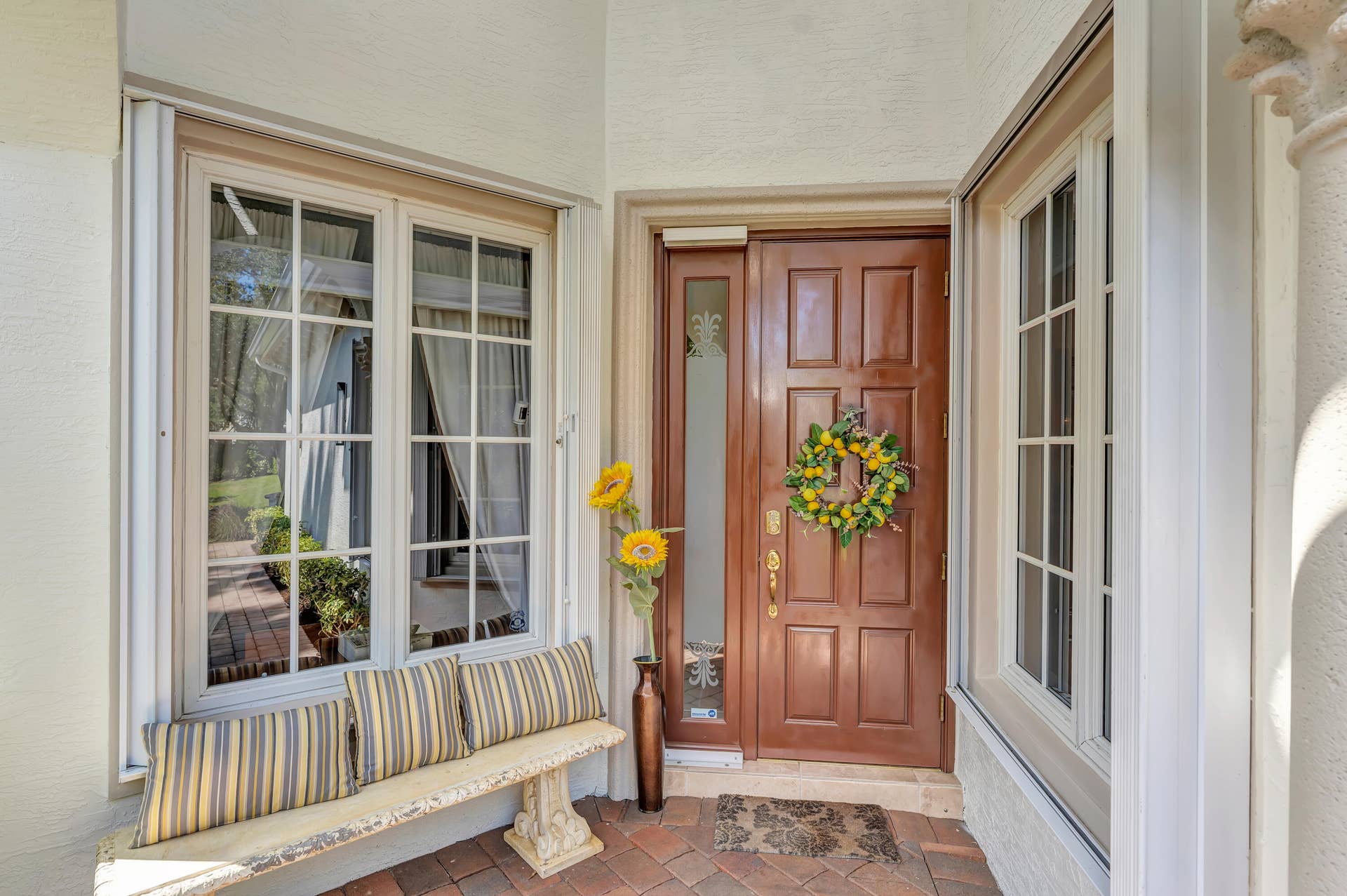 104 Renaissance Drive, North Palm Beach, FL 33410 Day light front entrance facing NE