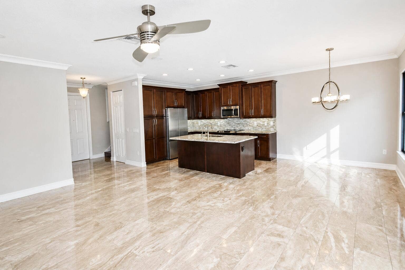 8079 Snowflake Obsidian Trail, Delray Beach, FL 33446 kitchen and living new