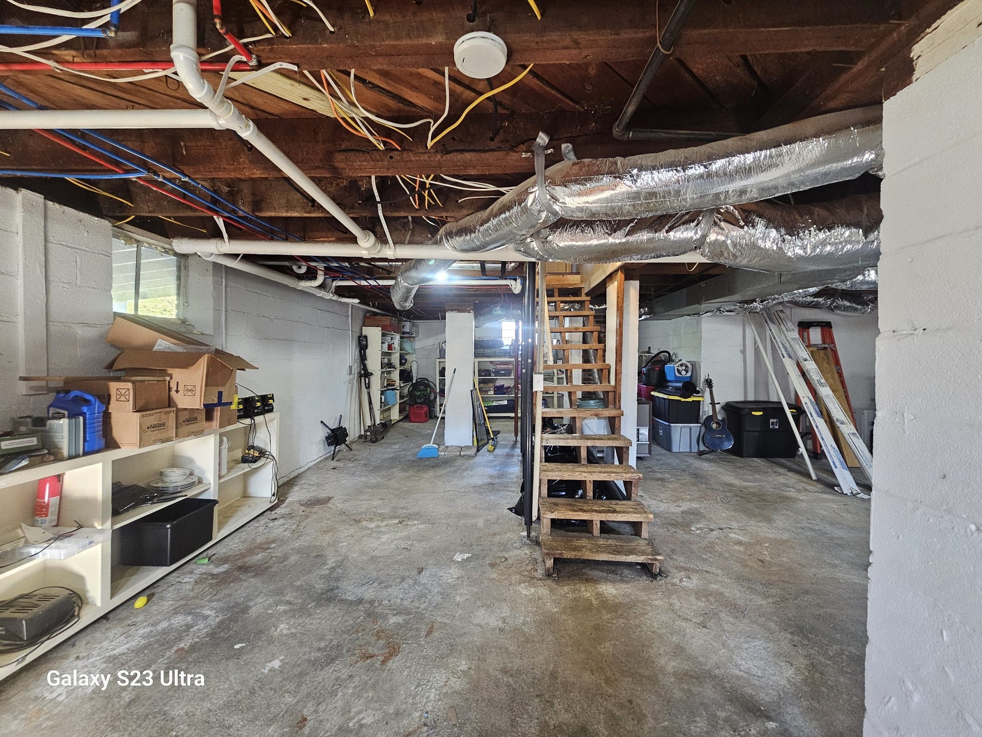 218 Garfield St, McMinnville, TN 37110 Climate-controlled basement with direct access to a spacious 4-car carportperfect for comfort and convenience year-round.