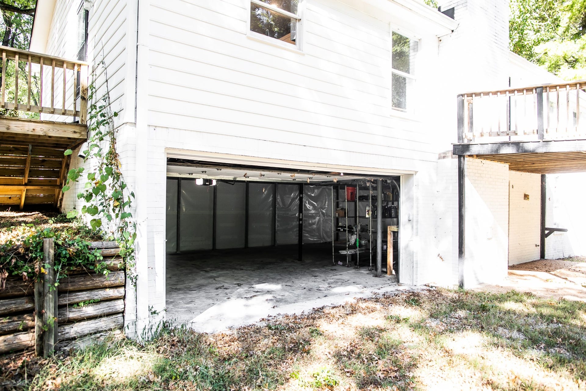 2 Car Garage with TONS OF STORAGE and room to RENOVATE