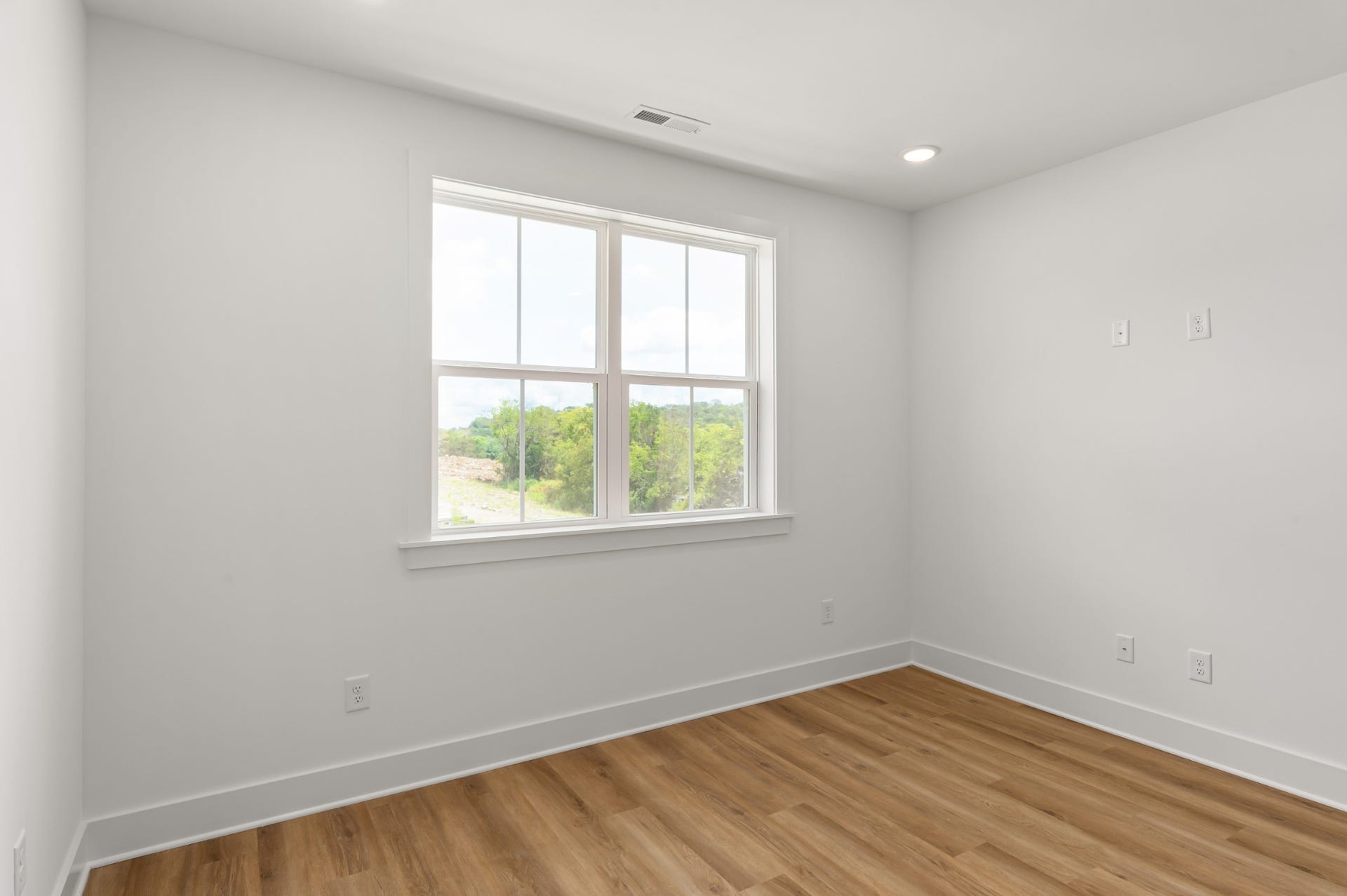 3310 Conviser Dr, Nashville, TN 37207 Another view of the primary bedroom, where luxury meets comfort. This generous space offers a serene retreat, complete with large windows that flood the room with natural light and provide stunning views.