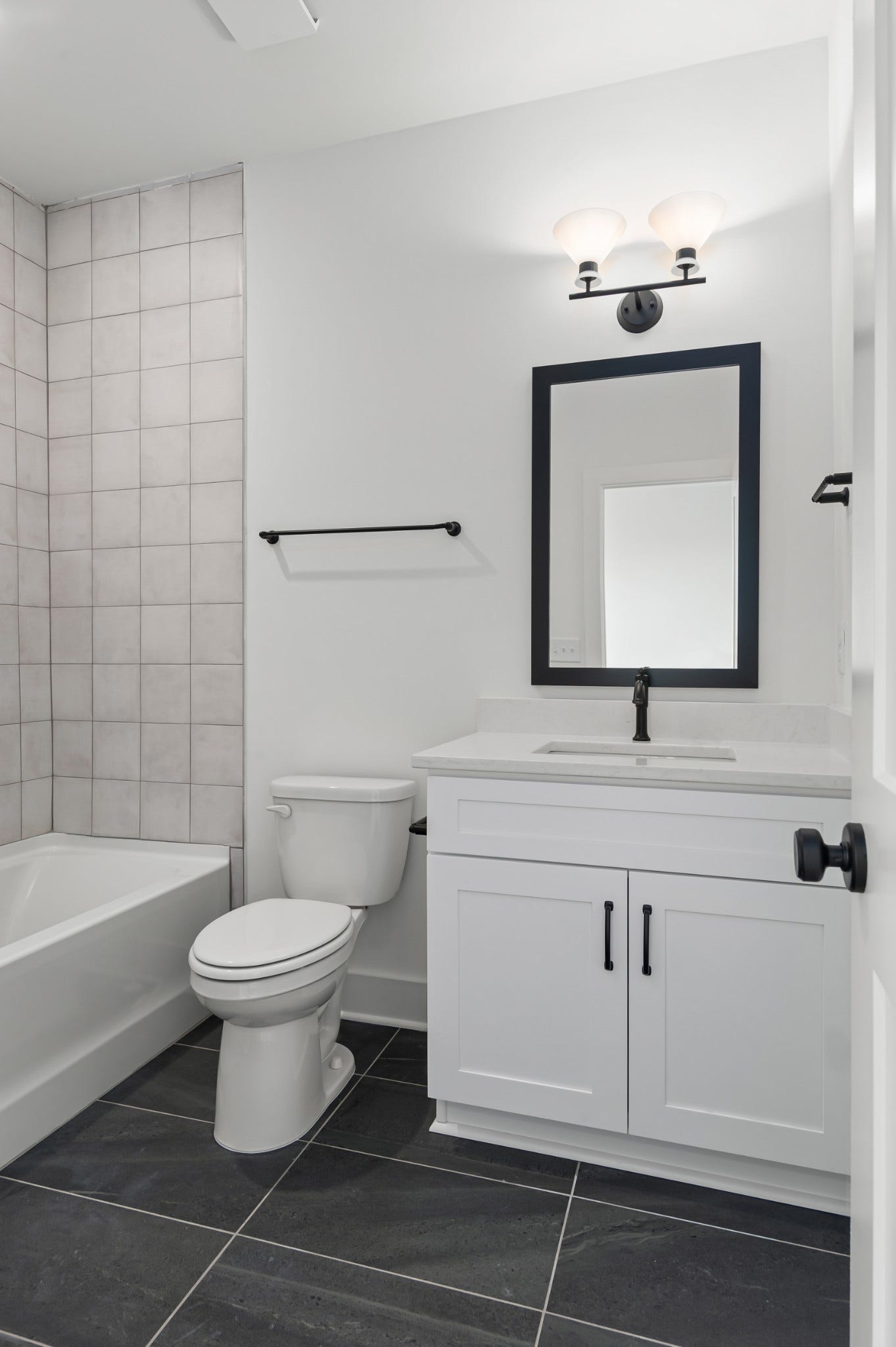 3310 Conviser Dr, Nashville, TN 37207 Your third en-suite bath offers the perfect blend of functionality and beauty, designed for convenience and style.