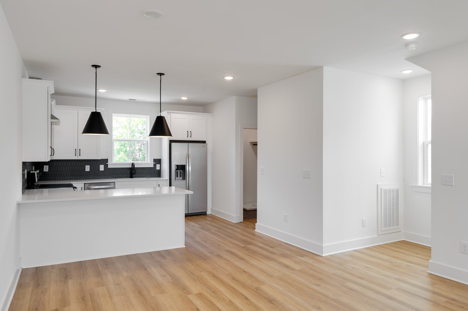 3310 Conviser Dr, Nashville, TN 37207 The kitchen is outfitted with sleek stainless steel appliances, and a stylish vent hood, --perfect for the home chef who loves both form and function.