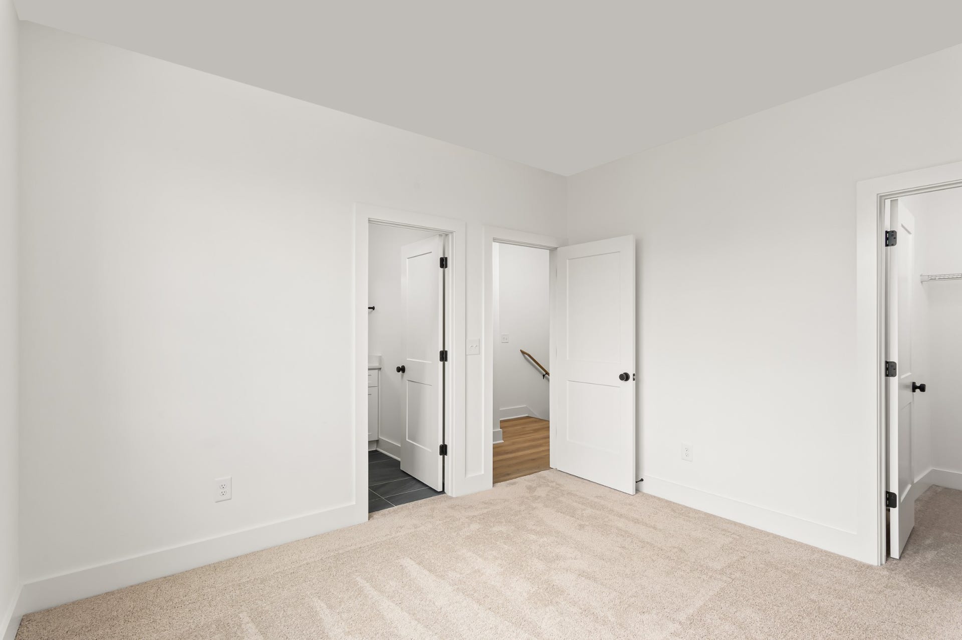 3310 Conviser Dr, Nashville, TN 37207 One of your secondary bedrooms that is designed for family living or guest accommodations. The highlight is the walk-in closet providing storage and organization options.
