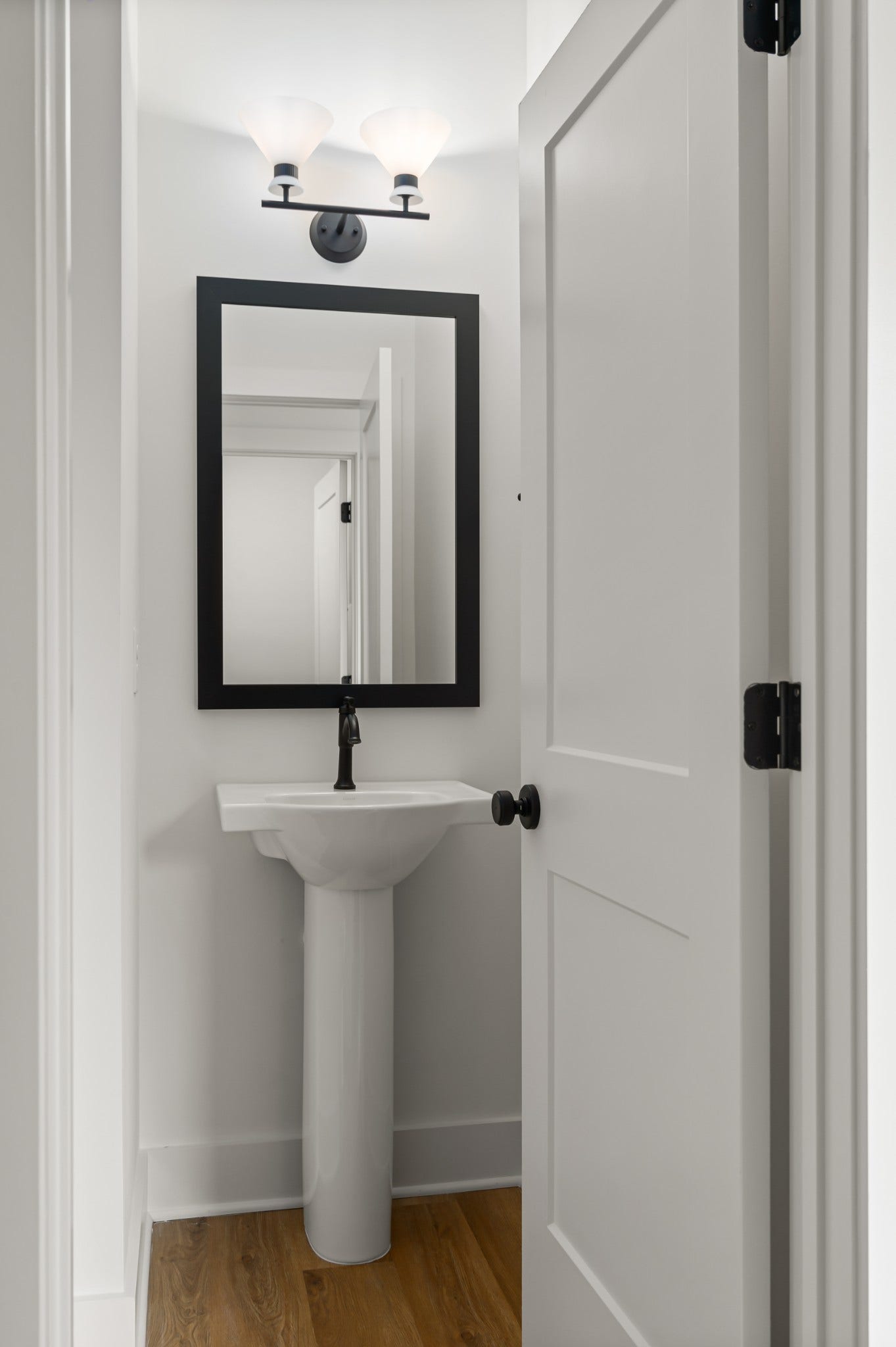 3310 Conviser Dr, Nashville, TN 37207 Your second floor powder room is perfect for guests and everyday use.