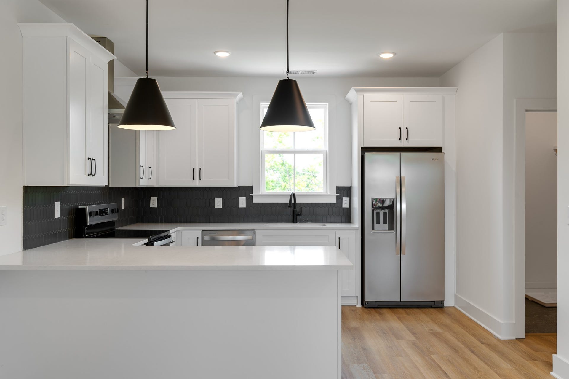 3310 Conviser Dr, Nashville, TN 37207 Welcome to your beautifully designed kitchen featuring sleek white options that create a bright and airy atmosphere. Your kitchen is both functional and inviting, making it a delightful space for meal preparation and entertainment.