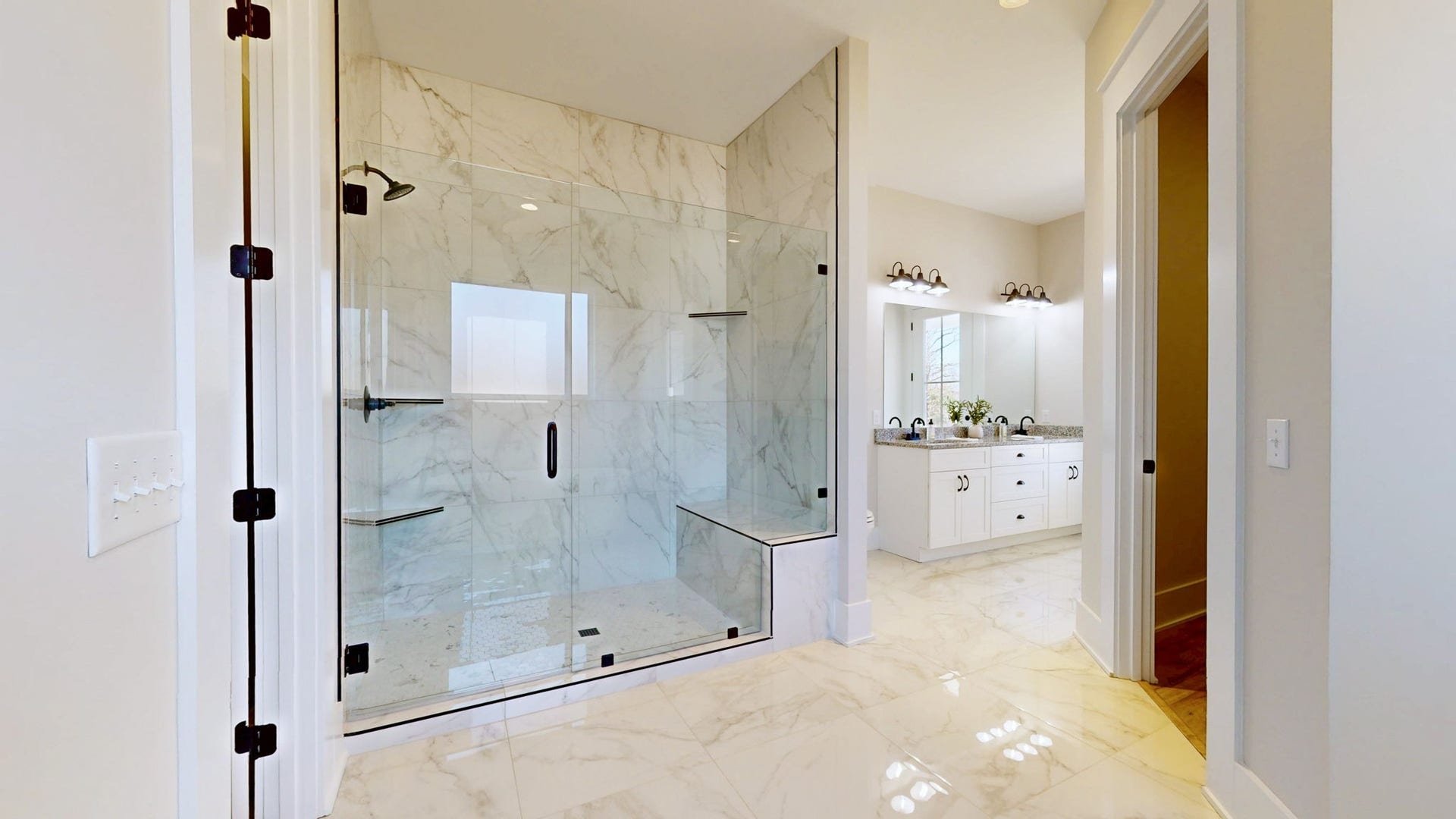 579 Lower Halls Mill Rd, Shelbyville, TN 37160 The primary bathroom is large and luxurious, with a step-in tile shower, soaking tub, double bowl vanity, and a large walk-in closet.