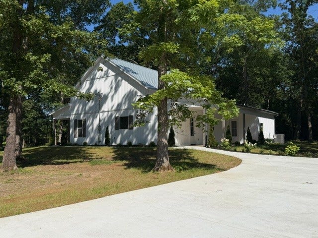 579 Lower Halls Mill Rd, Shelbyville, TN 37160 Great covered patio with entrance to the house at either end.