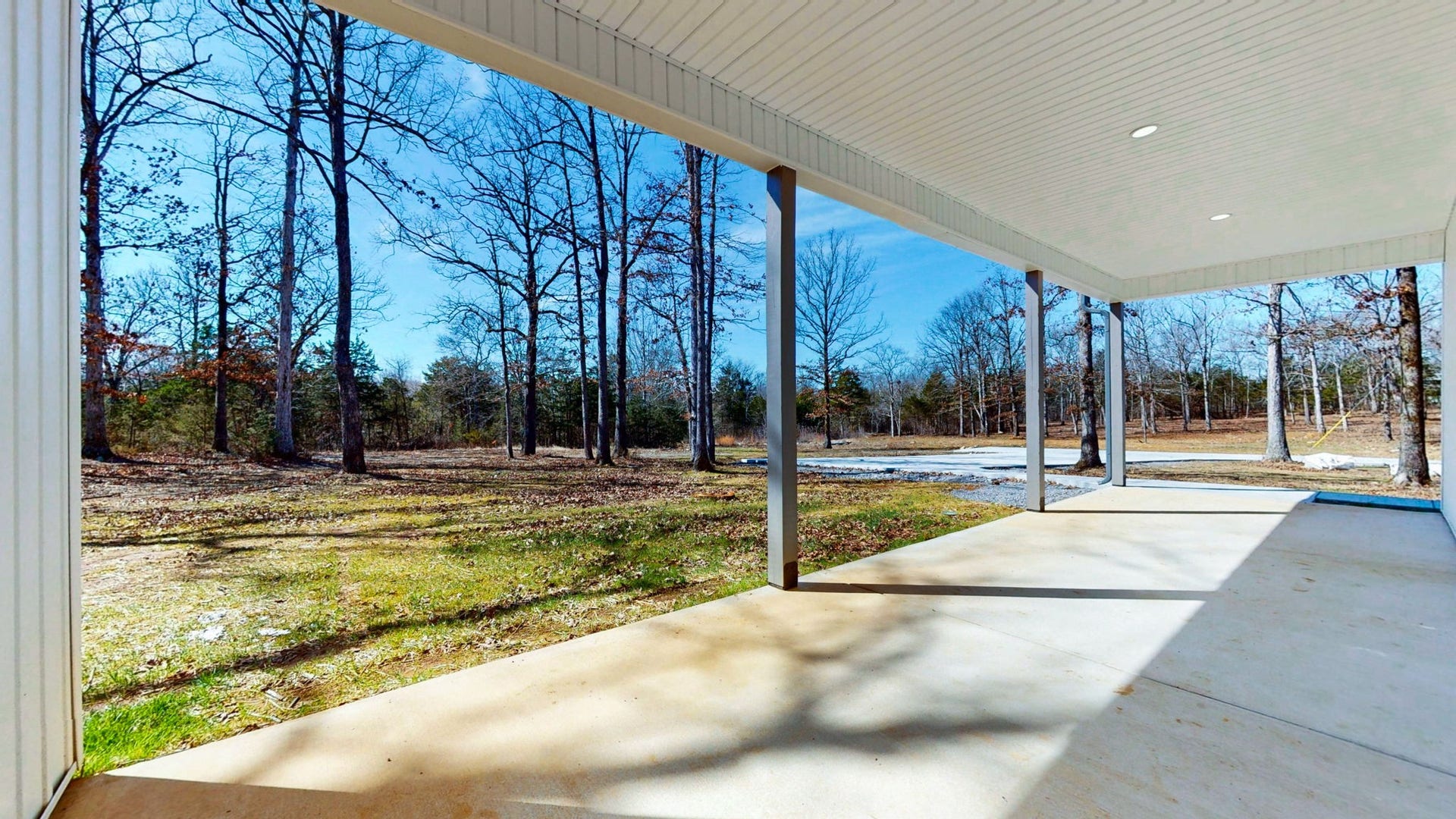579 Lower Halls Mill Rd, Shelbyville, TN 37160 Add your favorite outdoor furniture and enjoy the views from this covered patio that runs almost the entire length of the house.