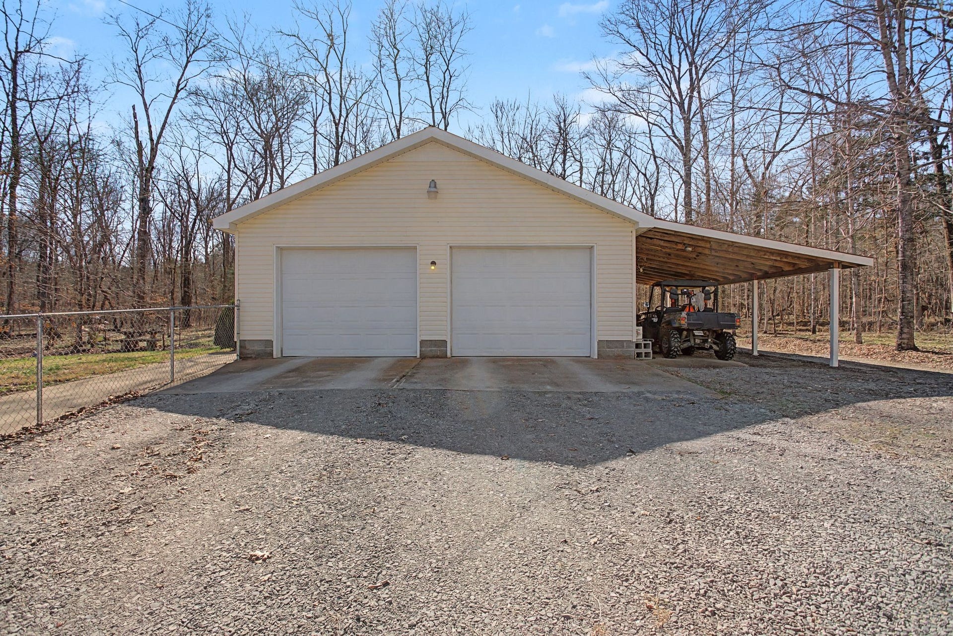 1545 Irwin Rd, Lewisburg, TN 37091 Two Car detached garage with garage door openers and covered carport