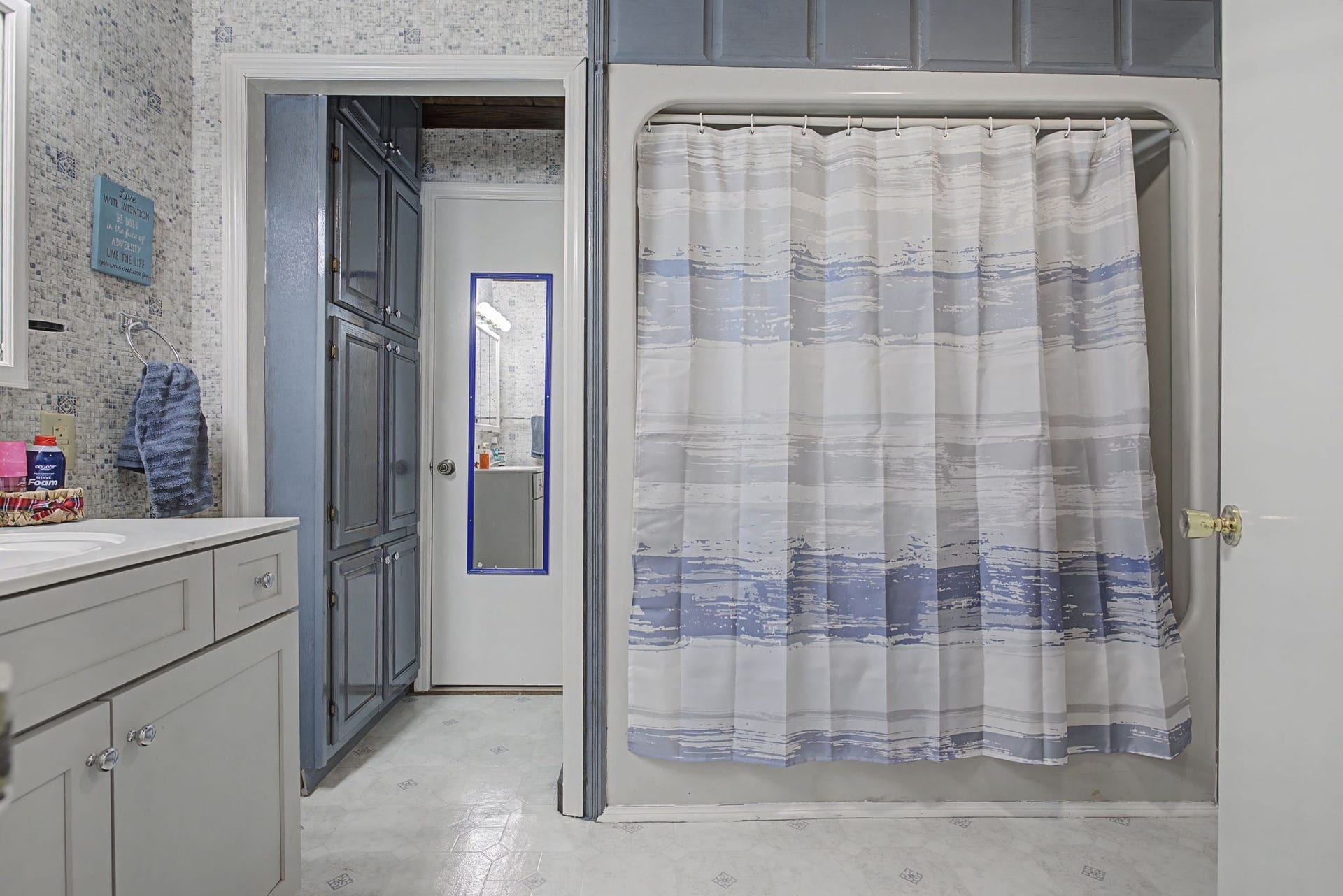 1545 Irwin Rd, Lewisburg, TN 37091 Hall bathroom with shower, tub and vanity