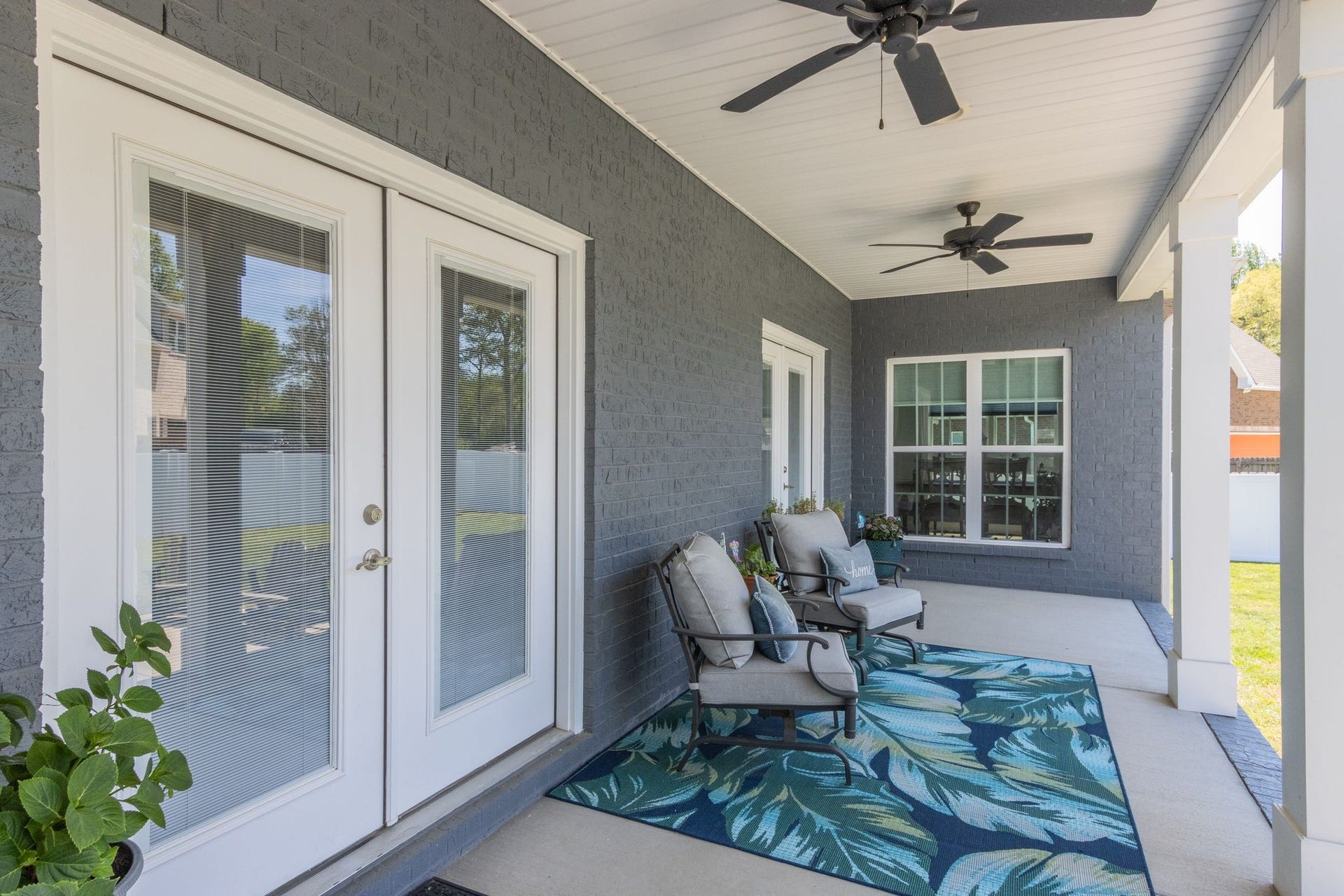 366 Lexington Cir, Manchester, TN 37355 Covered patio with dual fans
