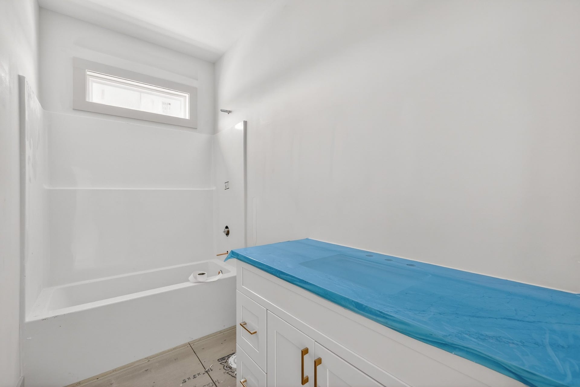 521 Powell Hollow Rd, Shelbyville, TN 37160 Guest bathroom with granite countertops and tile flooring to be installed
