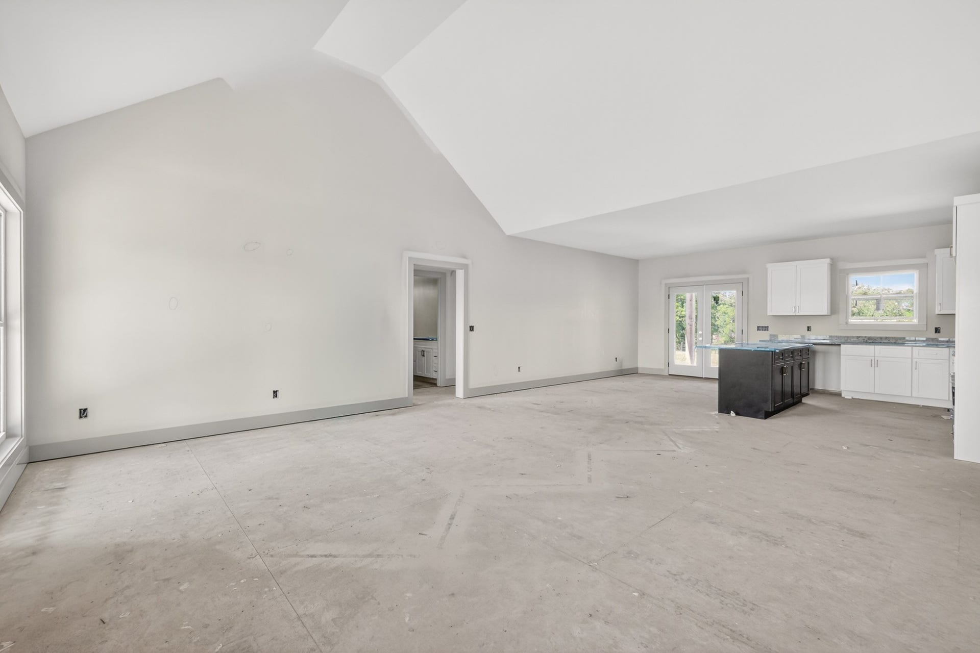 521 Powell Hollow Rd, Shelbyville, TN 37160 Open floor plan with living, dining, and kitchen space all centrally located