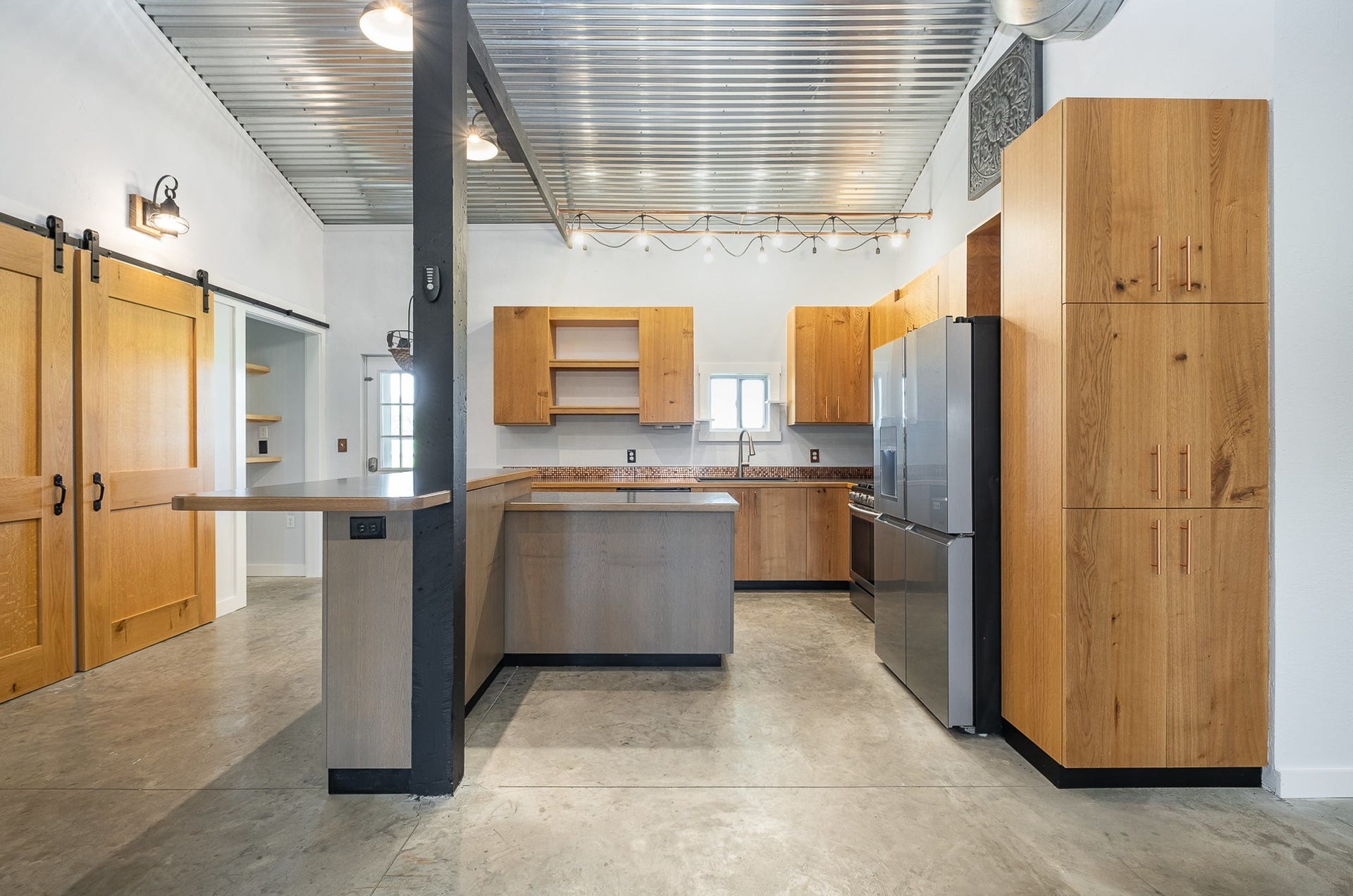 129 Highway 82 East, Bell Buckle, TN 37020 This barndominium was a labor of love and you won't find a kitchen like this in any other home. The cabinets are truly one-off, custom builds that speak to the care and consideration given to the home's overall design.