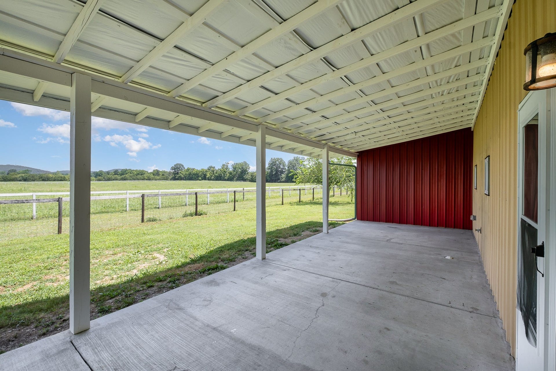129 Highway 82 East, Bell Buckle, TN 37020 The spacious covered porch can be a gathering place to relax and enjoy your favorite beverage, or, maybe you park the ATV's here while you grab a snack after some morning recreation.