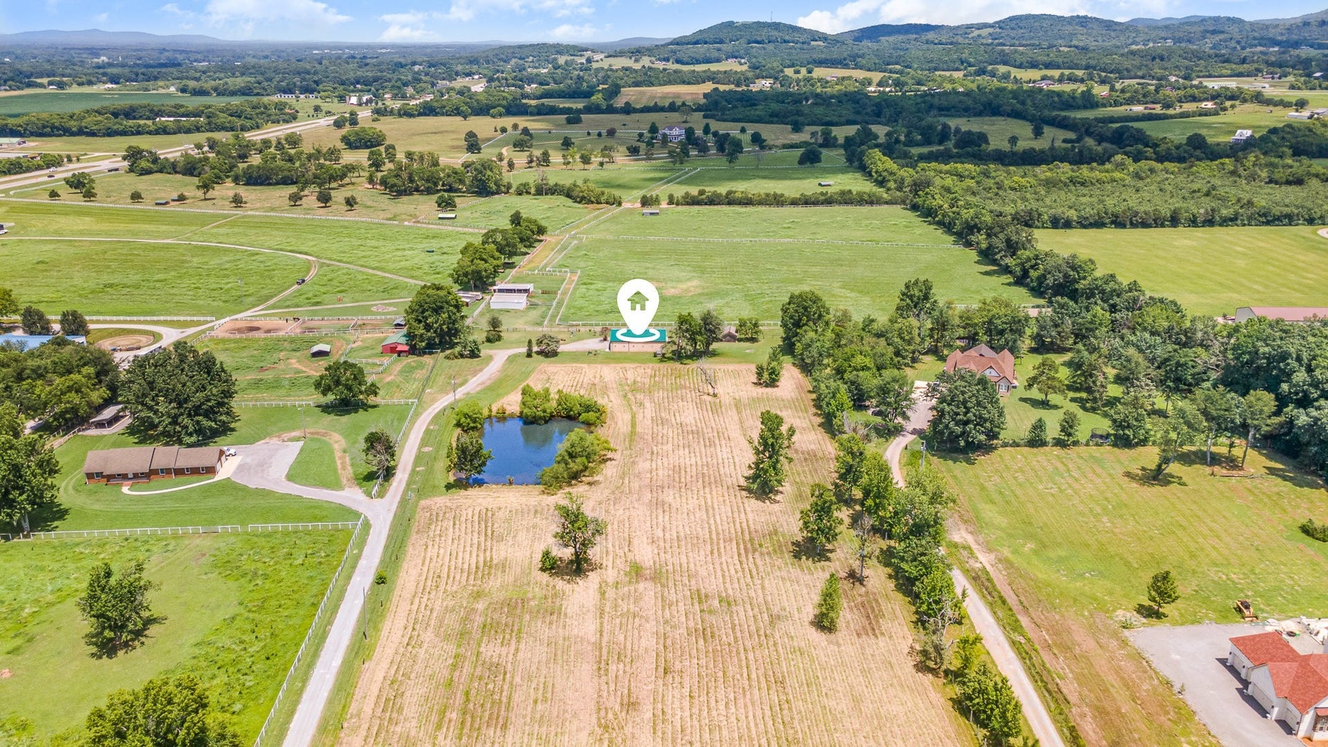 129 Highway 82 East, Bell Buckle, TN 37020 Aerial shot with home pinned, showing overall layout and location within surrounding properties.