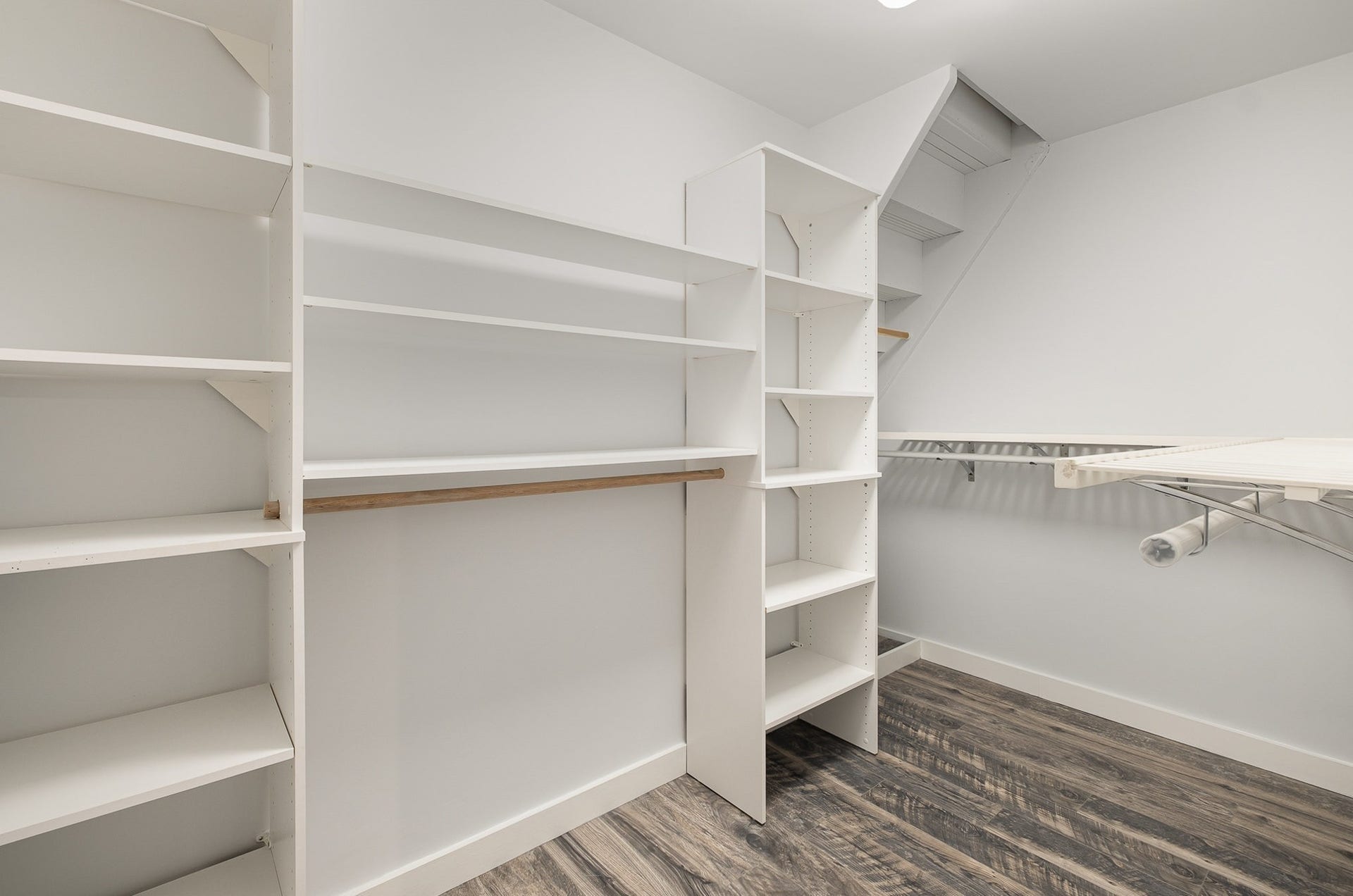 129 Highway 82 East, Bell Buckle, TN 37020 Walk-in closet attached to the bedroom. Custom cabinetry in here as well. Think of the time, money, and effort, having this already installed saves you.