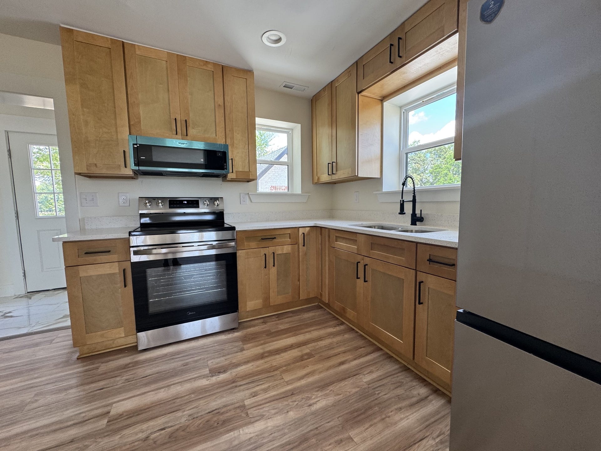 3313 McMinnville Hwy, Manchester, TN 37355 Kitchen features elegant Quartz countertops, cabinets, everything new, stainless steel Stove, refrigerator (w/ice/water inside ) and microwave.