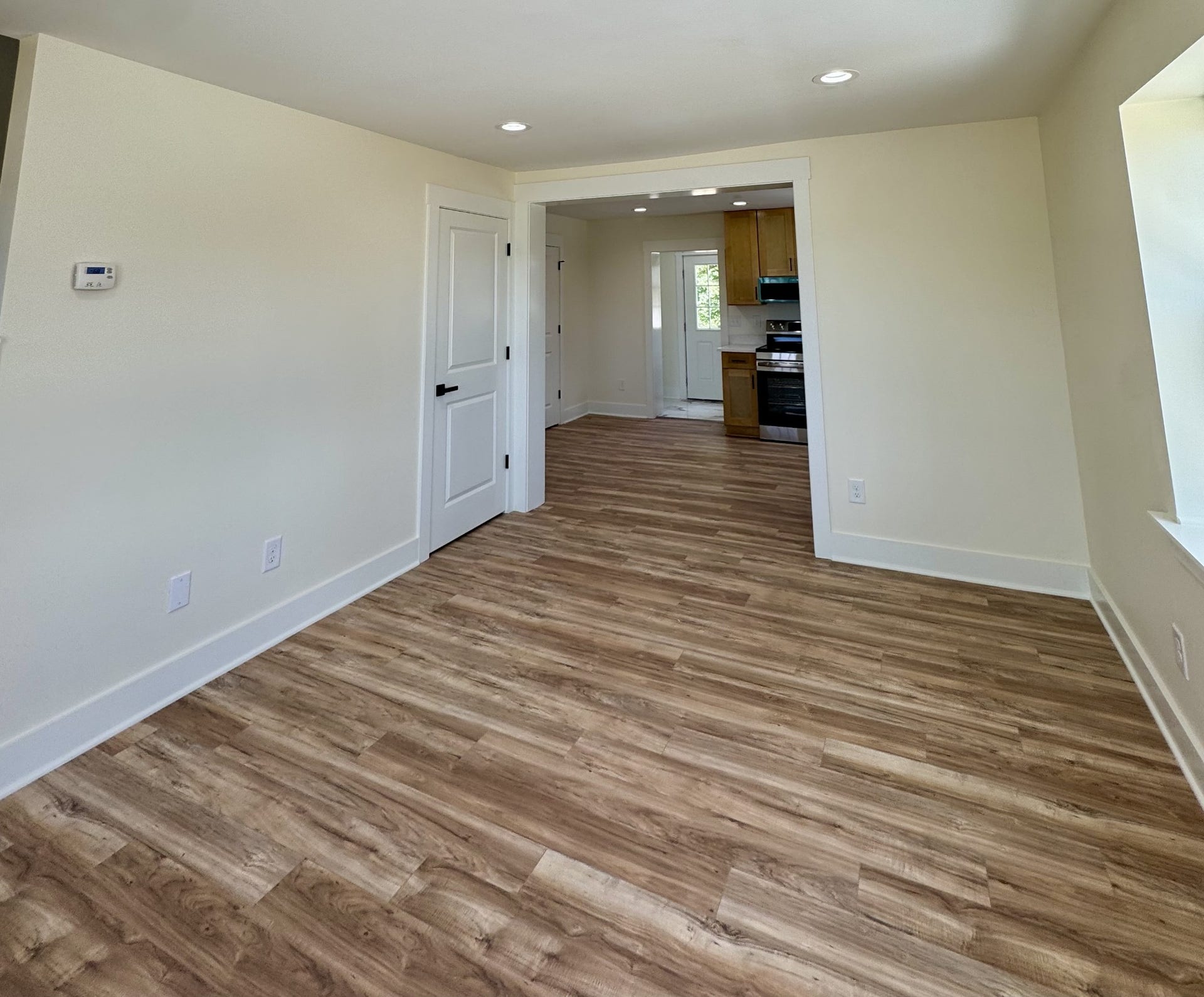 3313 McMinnville Hwy, Manchester, TN 37355 Great Room/Den with storage under the adjacent stairs.