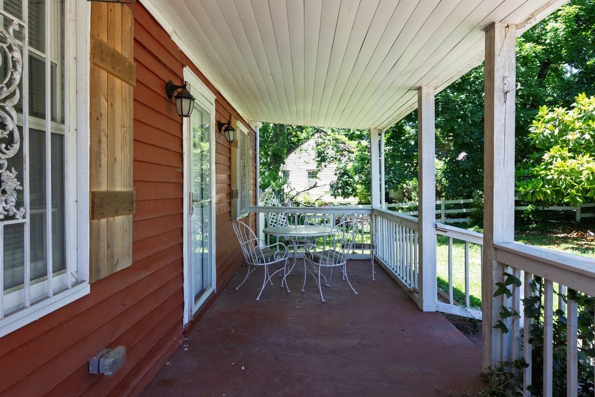 This covered porch practically says, grab a sweet tea and stay awhile.