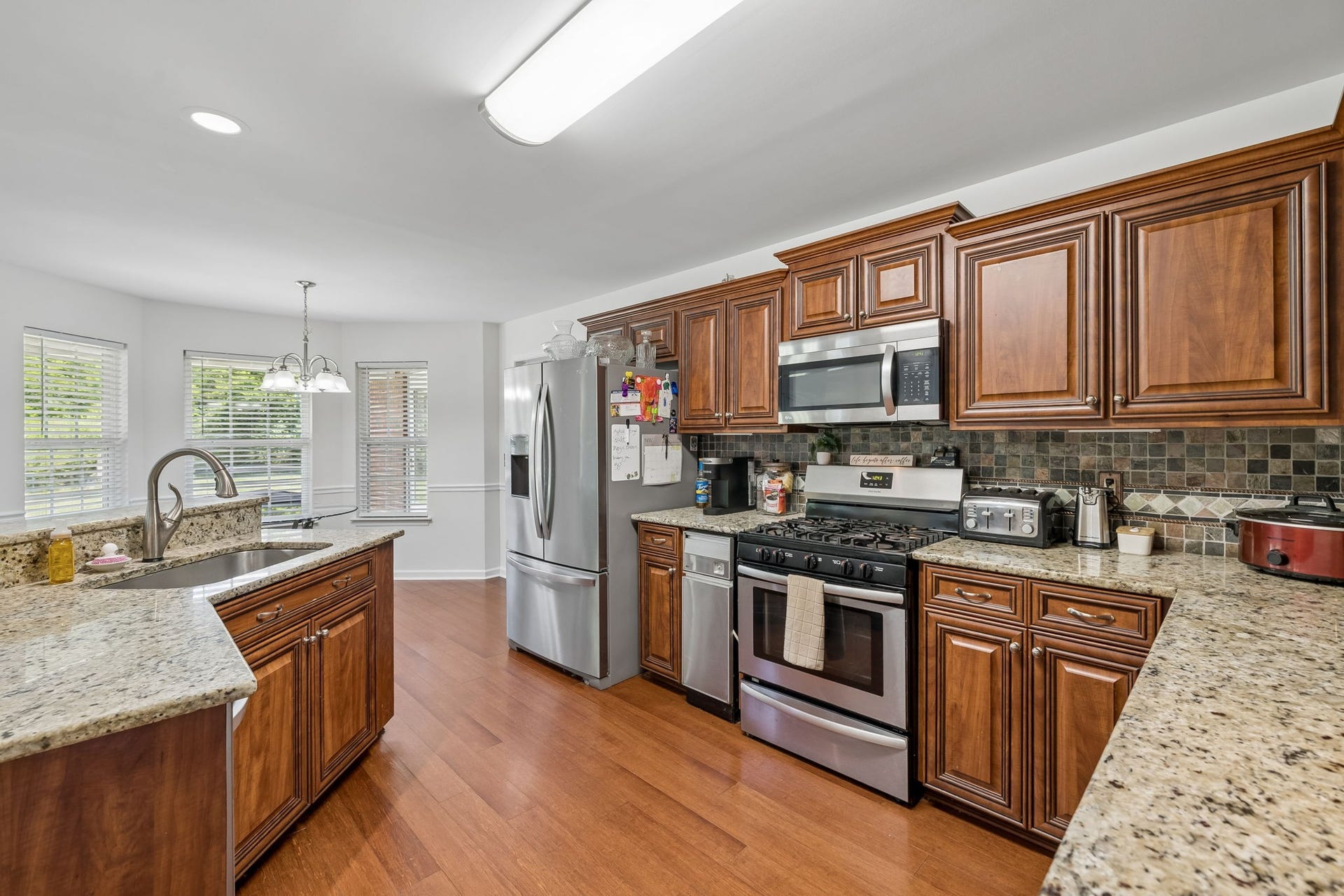 120 Callaway Ct, Murfreesboro, TN 37127 Kitchen equipped with granite countertops and stainless steel appliances including a gas top stove! 120 Callaway Court, Murfreesboro, TN 37127