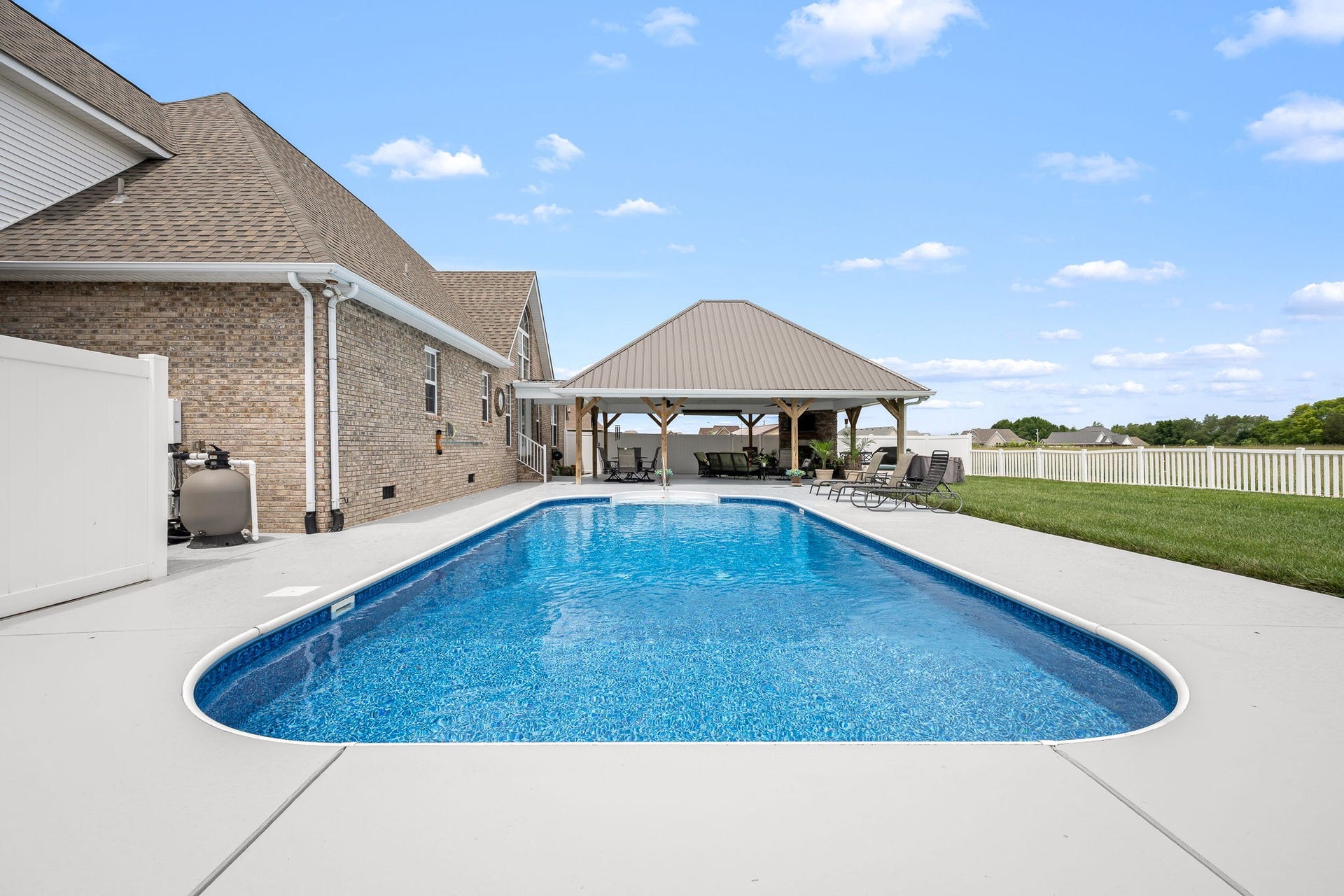 144 Richland Ct, Manchester, TN 37355 Dive into luxury with your very own inground saltwater pool, nestled within a beautifully landscaped private backyard.