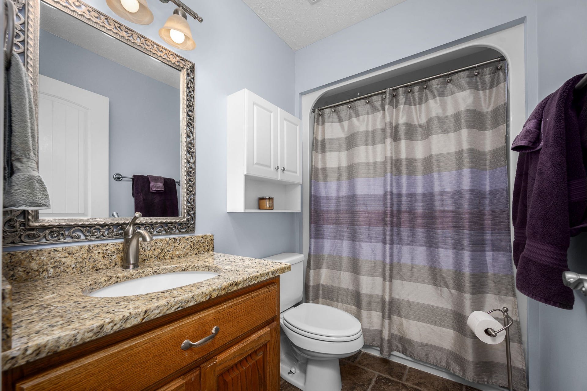 144 Richland Ct, Manchester, TN 37355 The full bath upstairs features a single vanity with granite countertops, tile flooring and a shower/tub combo. It is convenient to 2nd & 3rd bedrooms.